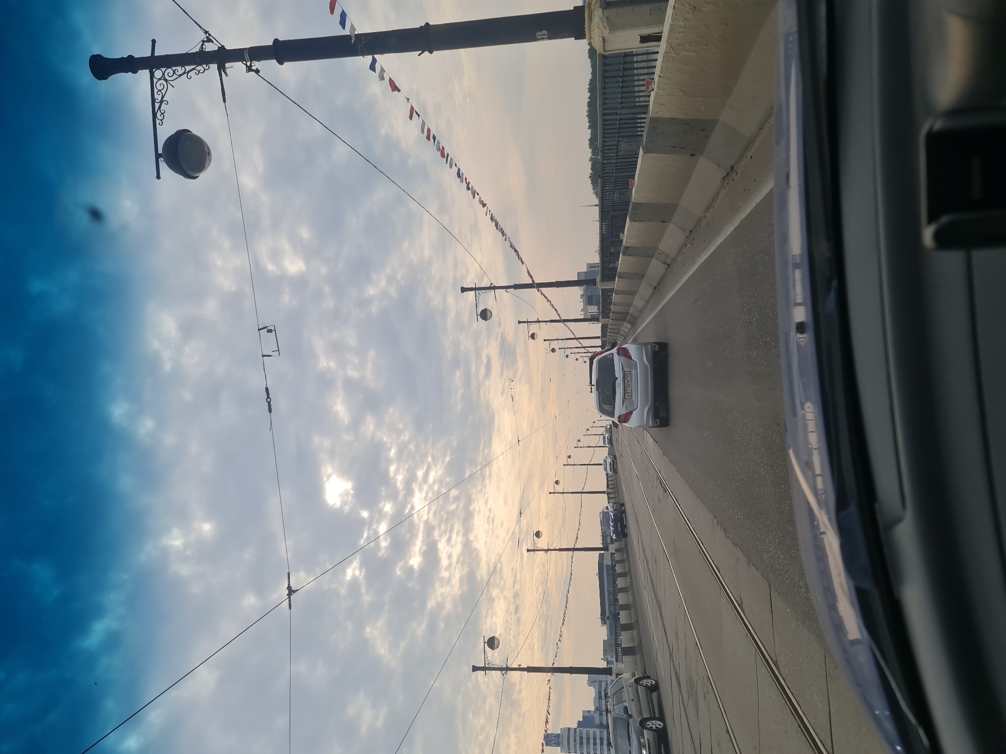 Moving through Irkutsk: bridge, train, and city streets
