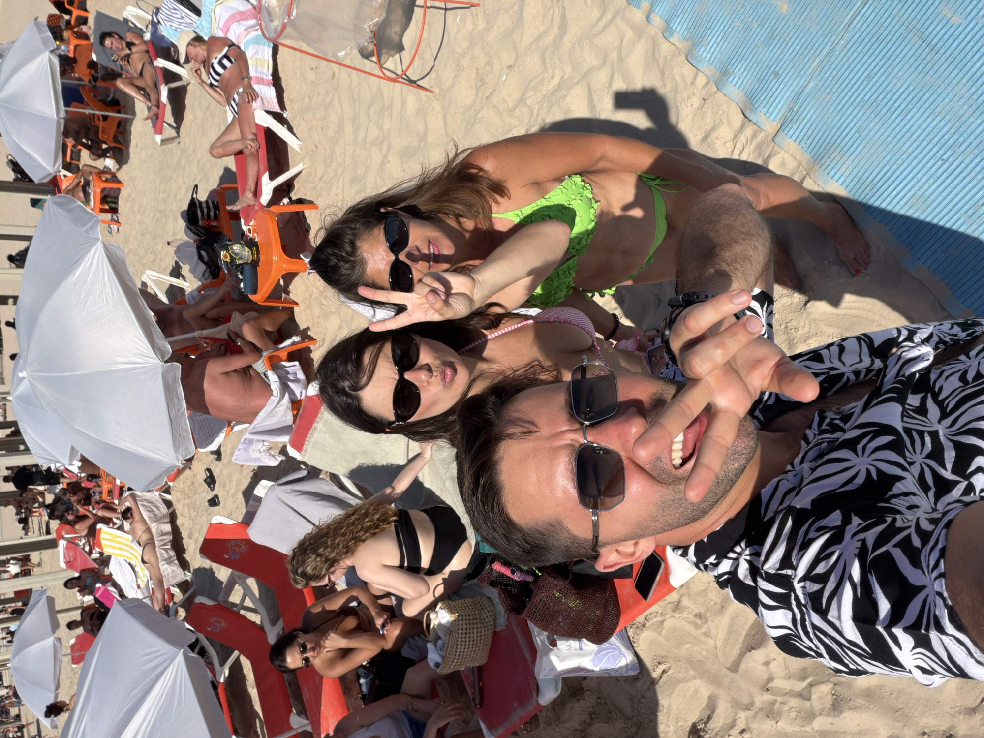 Tel Aviv witnesses document beach selfies, Billie Eilish quote sign