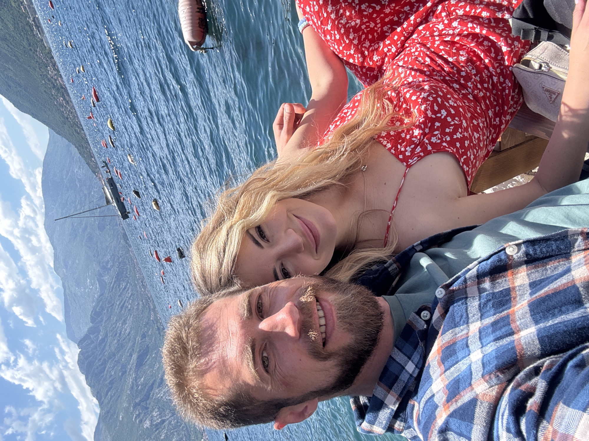 Couple enjoys seafood dining and seaside recreation in Montenegro