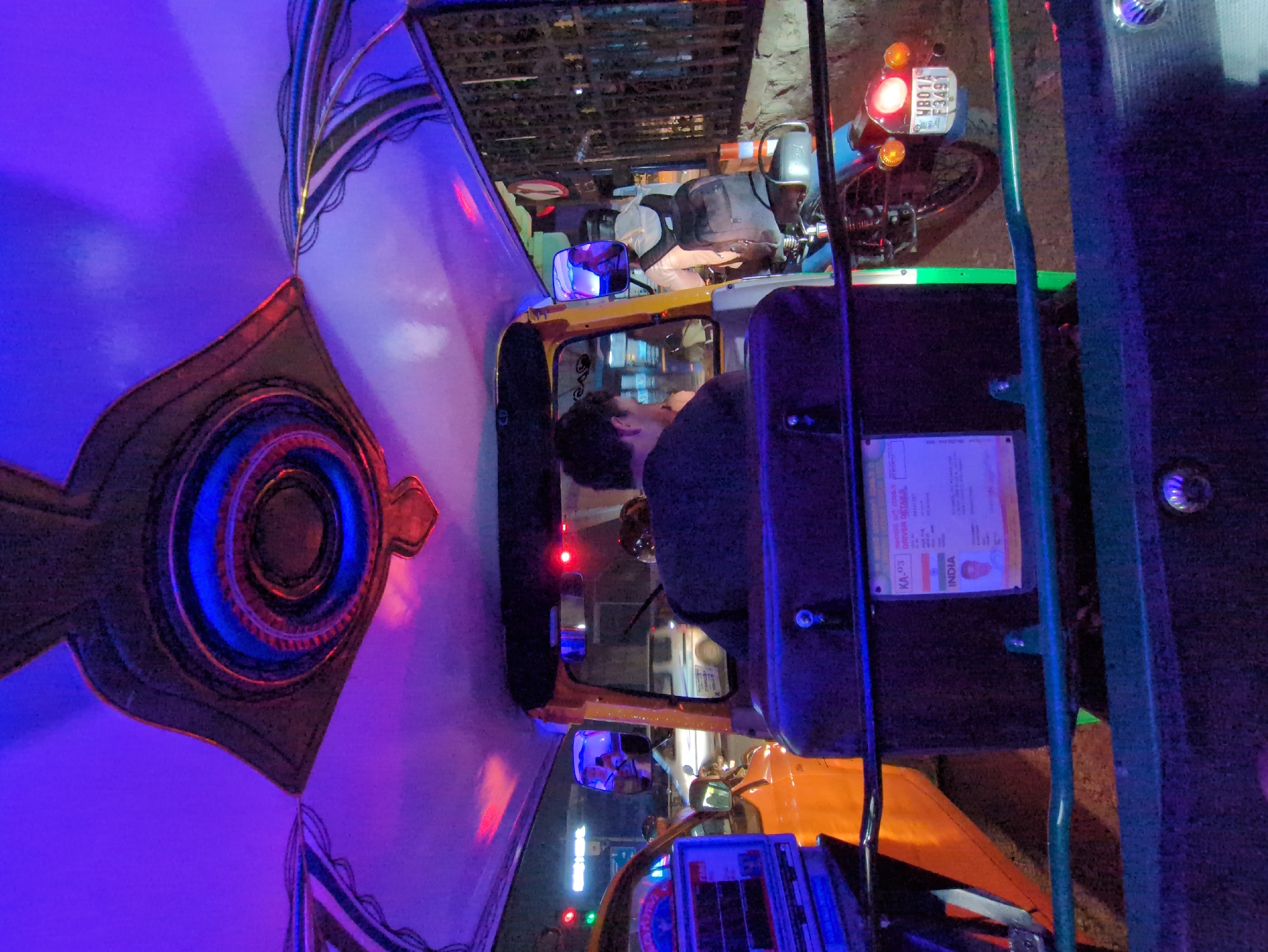 Nighttime auto-rickshaw ride documented in Bengaluru streets