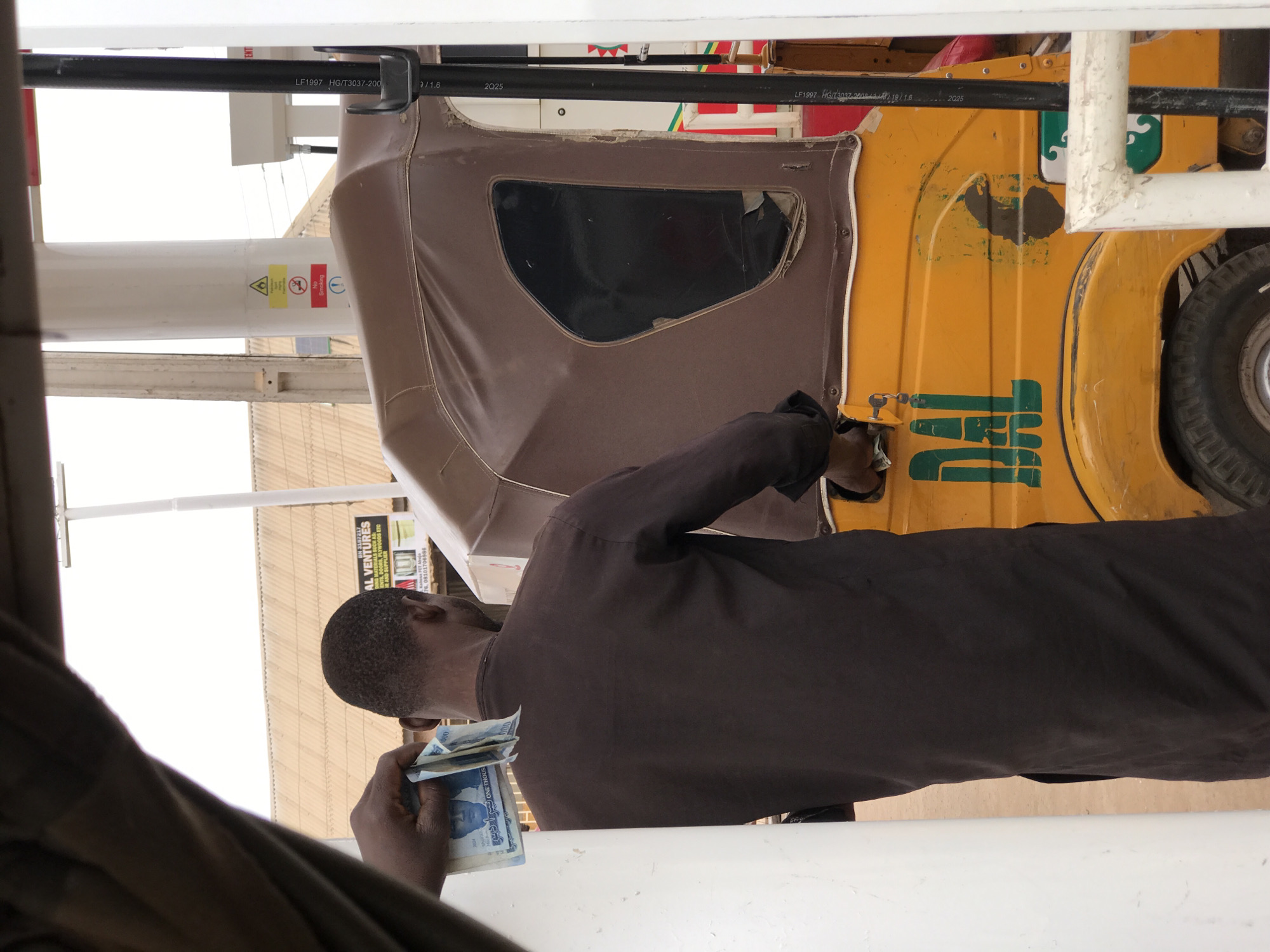 Morning fuel station transactions documented across Abuja commercial districts