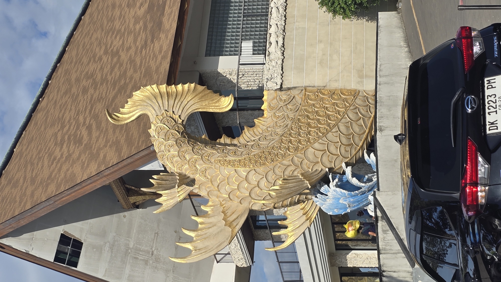 Golden fish sculpture spotted in Denpasar, Indonesia