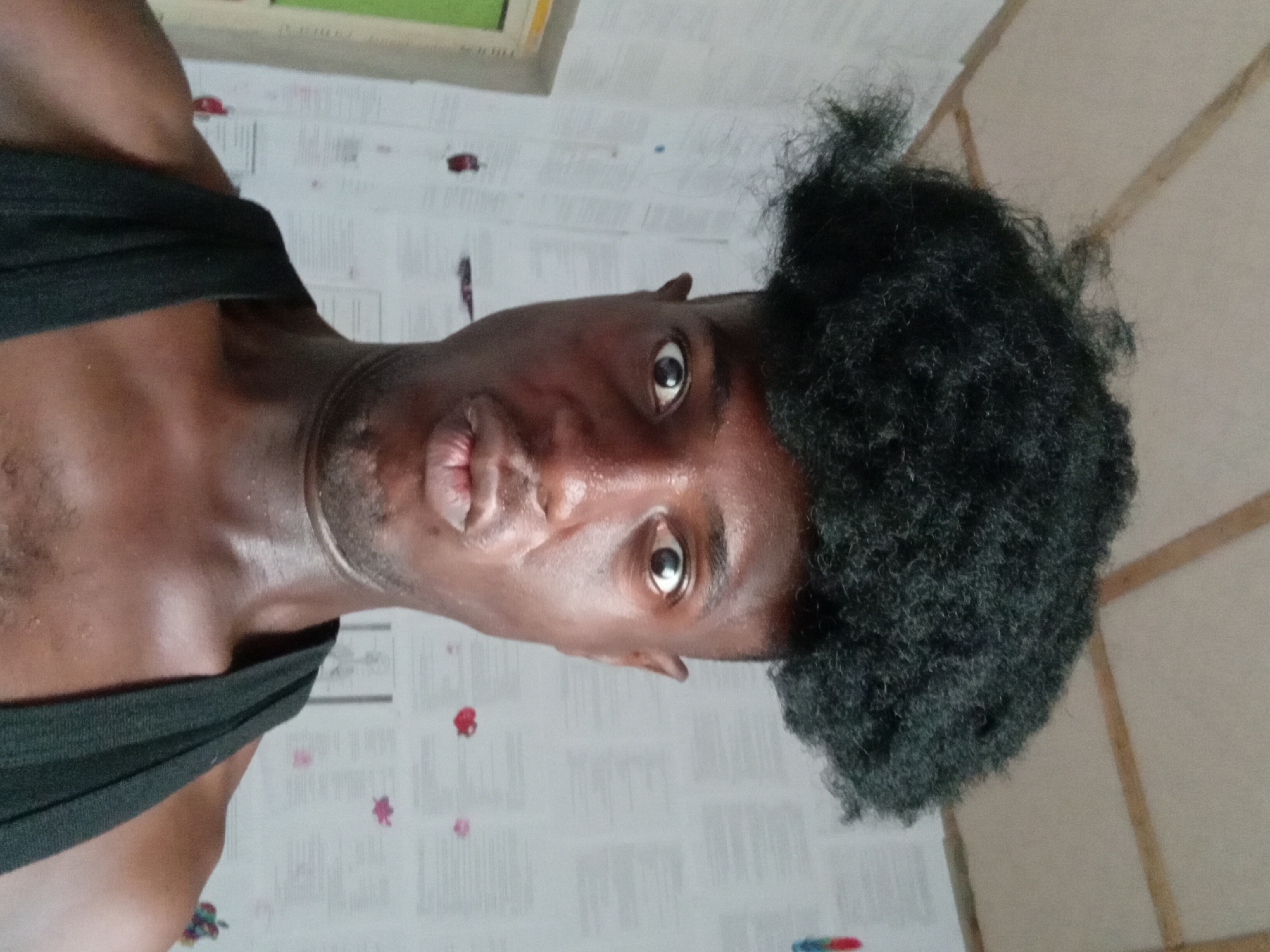 Man captured in everyday moments with household items in Nigeria