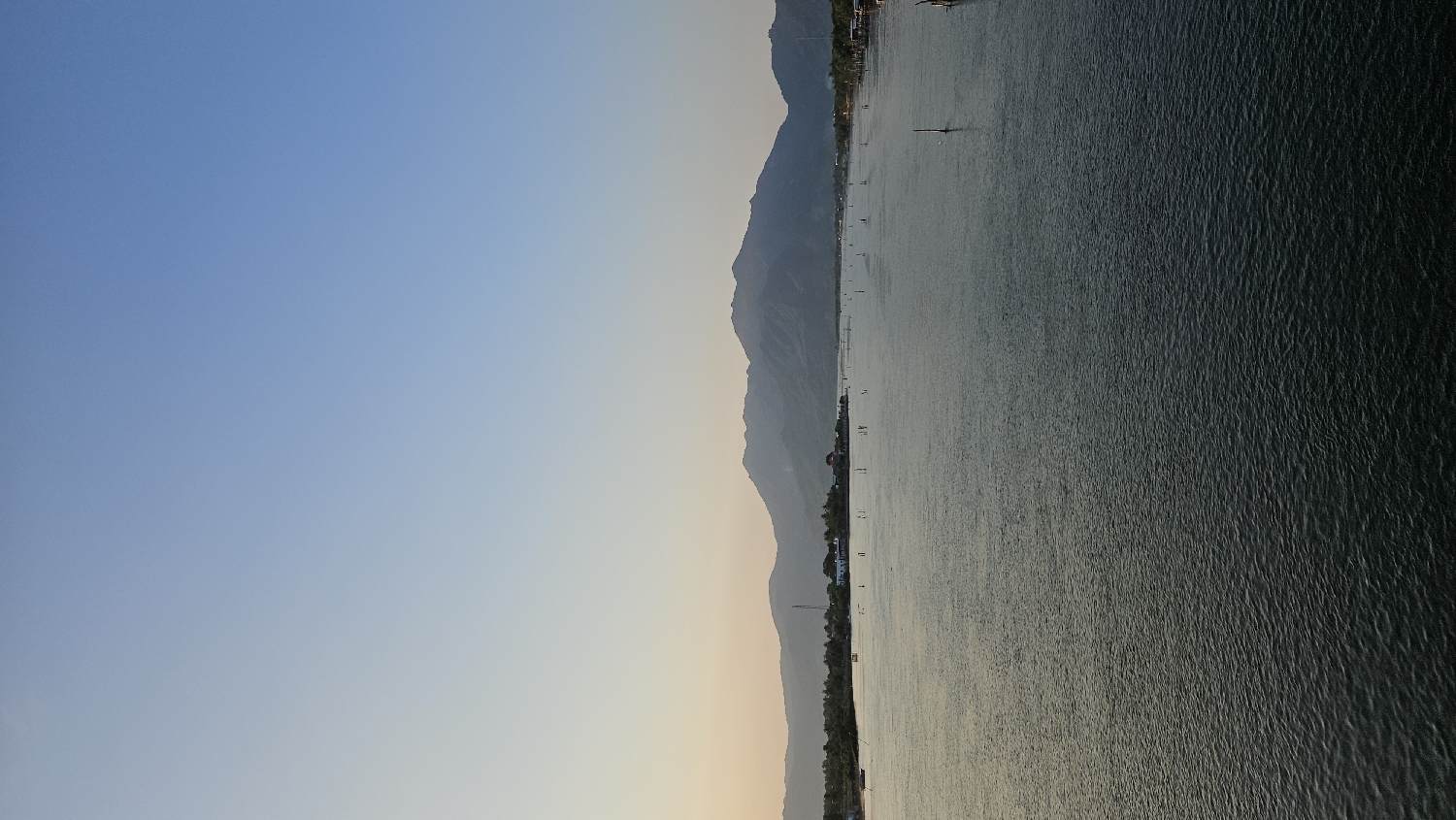 Sunset panorama captured over water body in Cam Đức