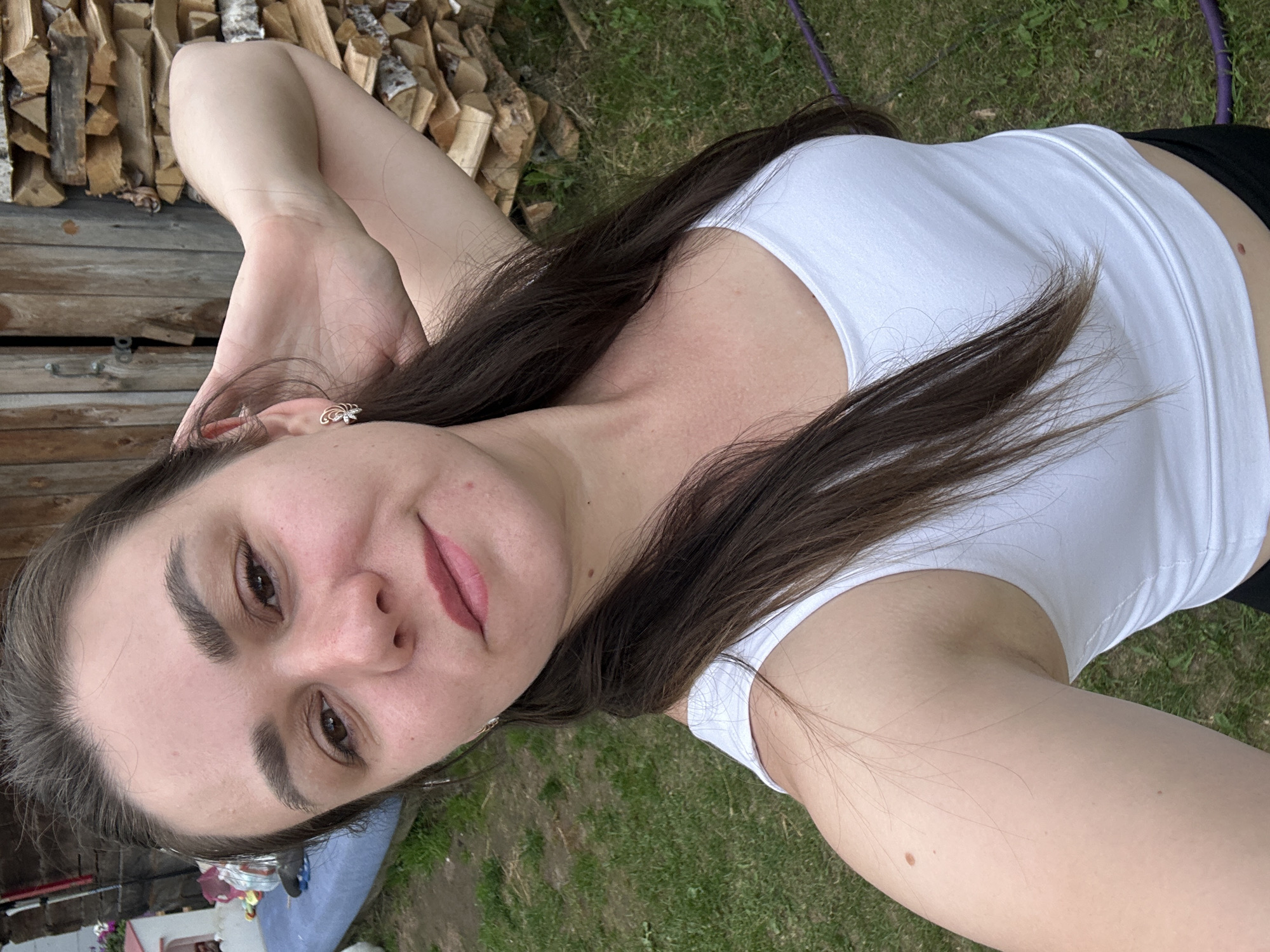 Family backyard afternoon in Chaikovsky with outdoor play and pets