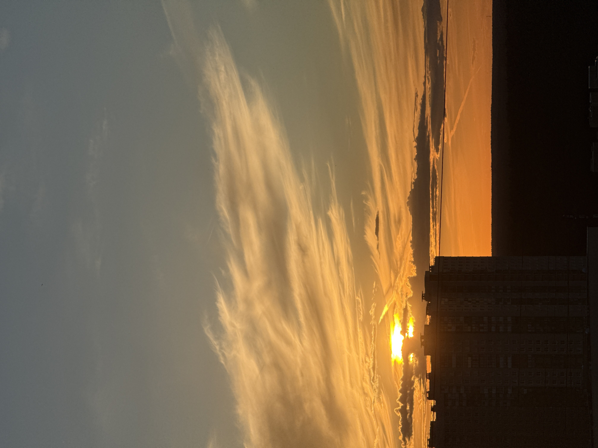 Golden hour over Khimki's skyline, dusk to crescent moon