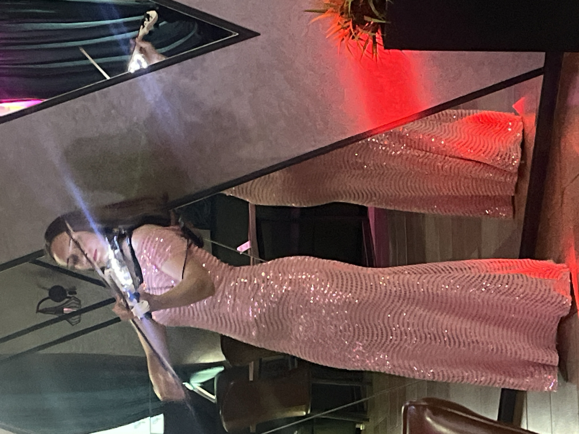 Live violin, group photos, and a meal at an Orsha event