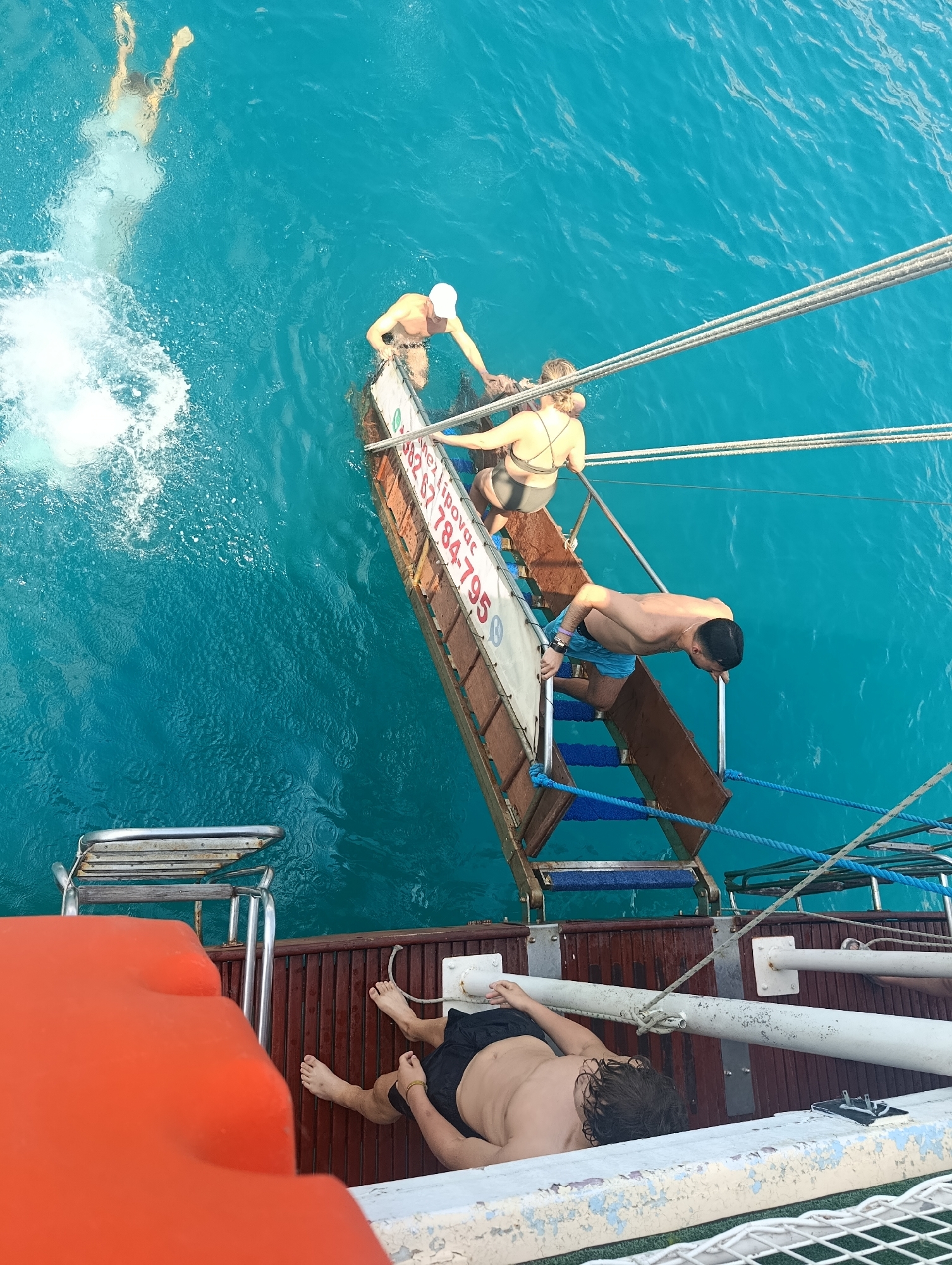 Boat swim stop in the turquoise waters off Montenegro
