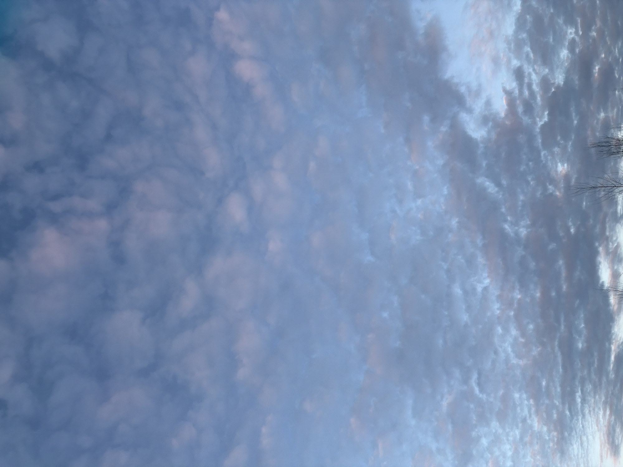 Spring afternoon sky and roadway documented in Noviy, Russia