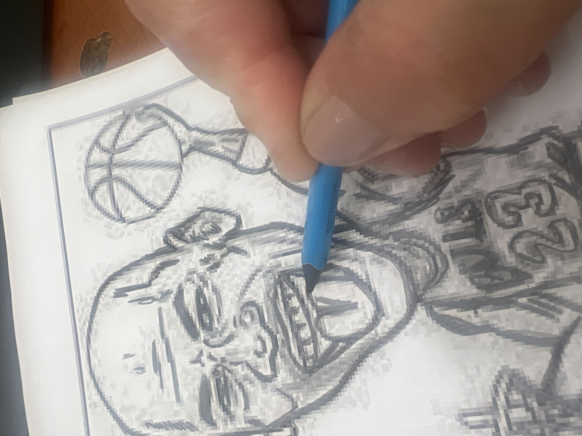 Artist creates basketball player drawing in Russian workspace session