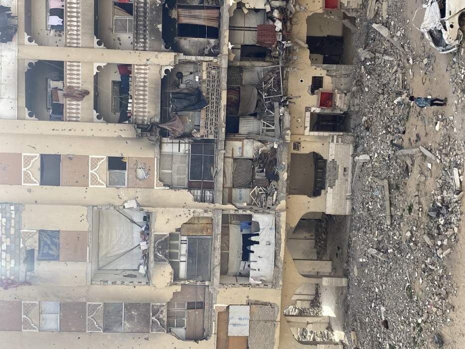 Children Navigate Rubble-Strewn Khan Yunis Amid Widespread Building Damage