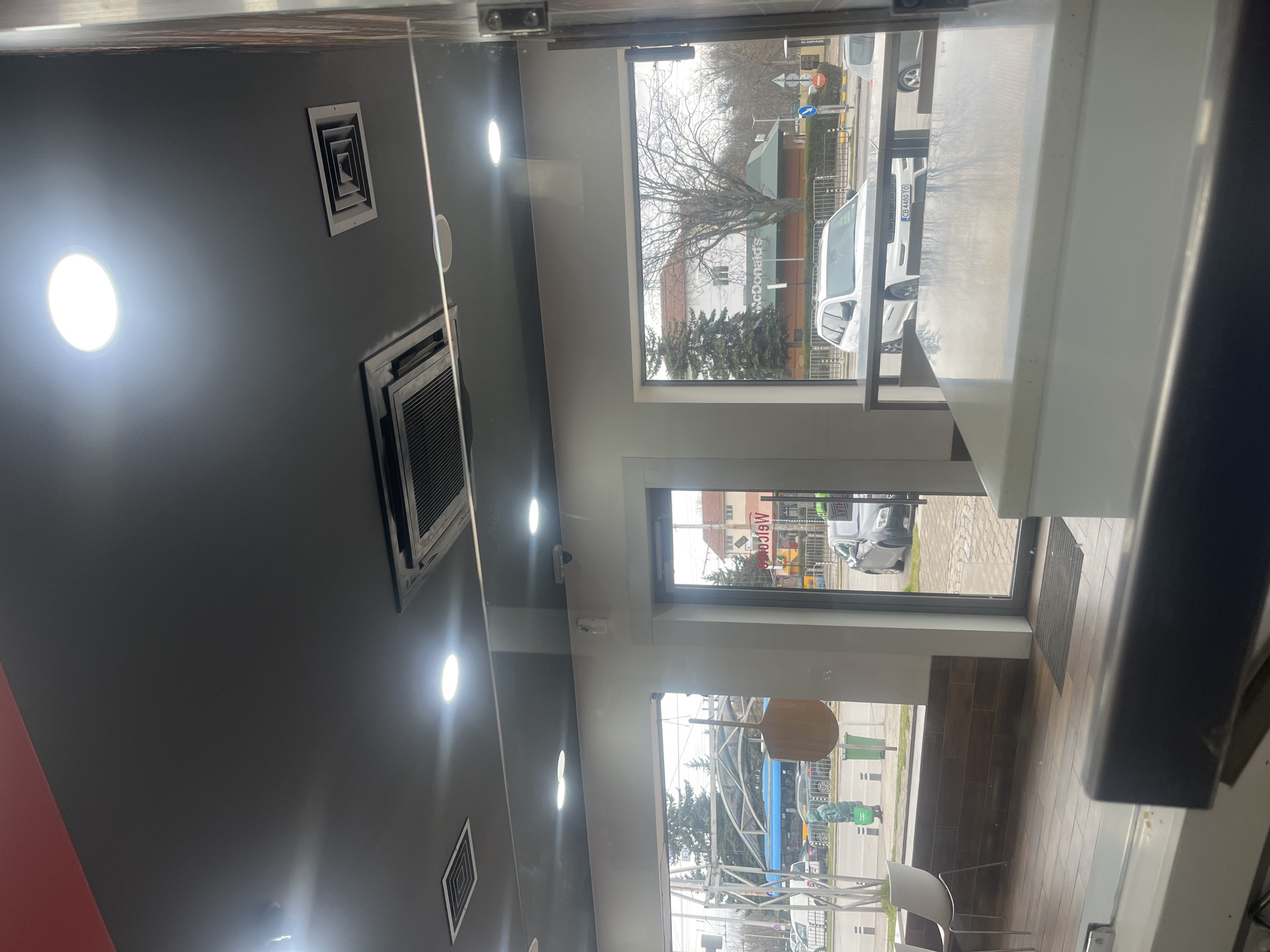 Interior business view overlooks Sofia cityscape with McDonald's visible
