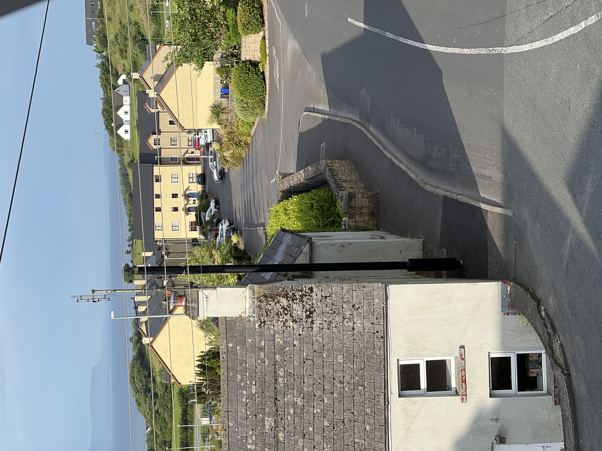 Cash, fruit, and coastal rooftops on a Donegal morning