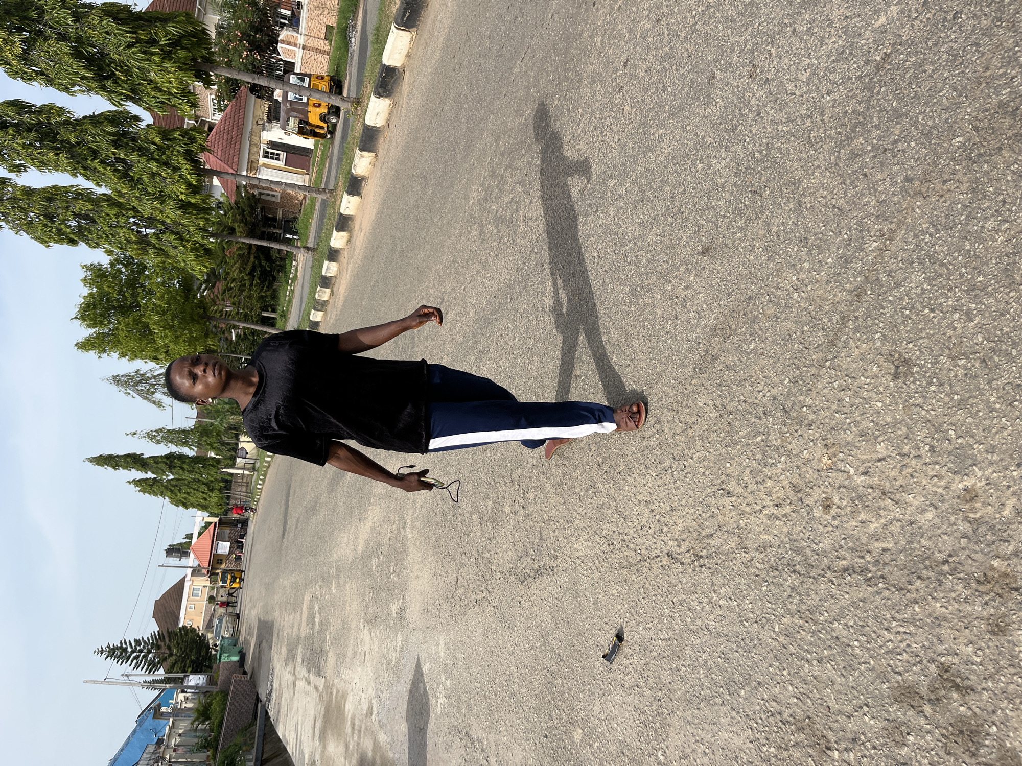 Morning street life documented across Abuja residential areas
