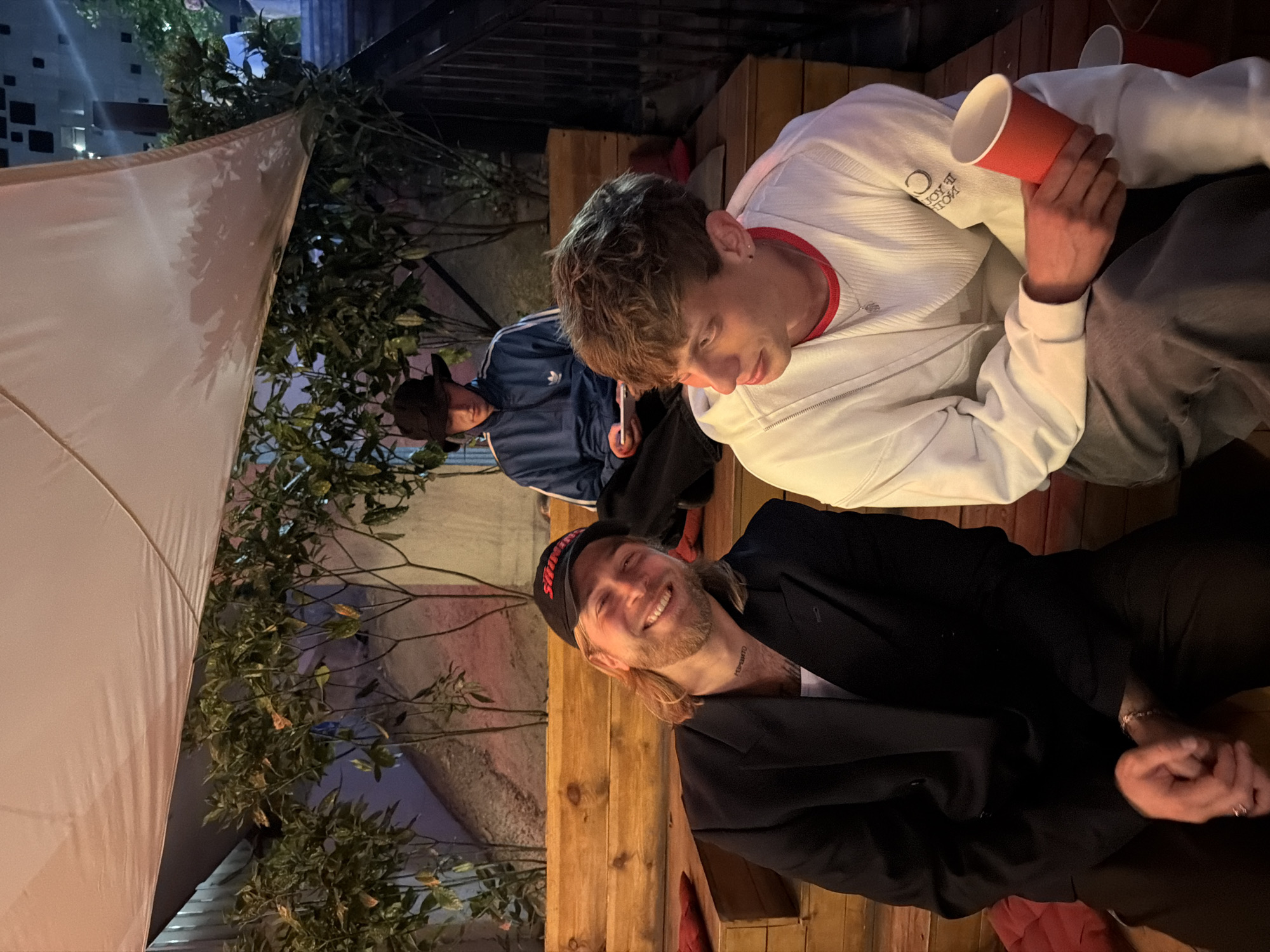 Relaxed patio hangout under a white canopy in Tbilisi