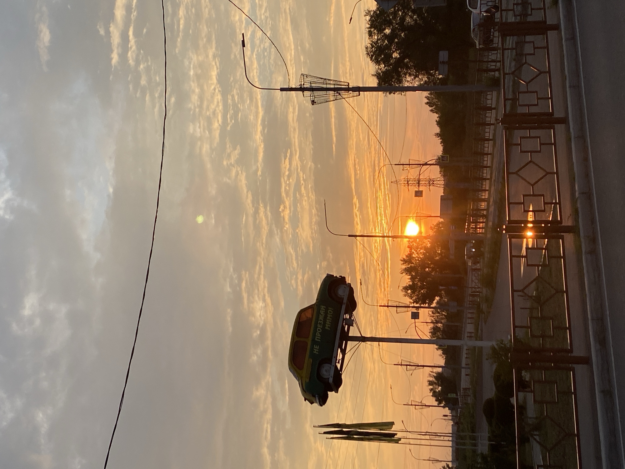 Minusinsk streets and landmarks at golden hour, July 2026