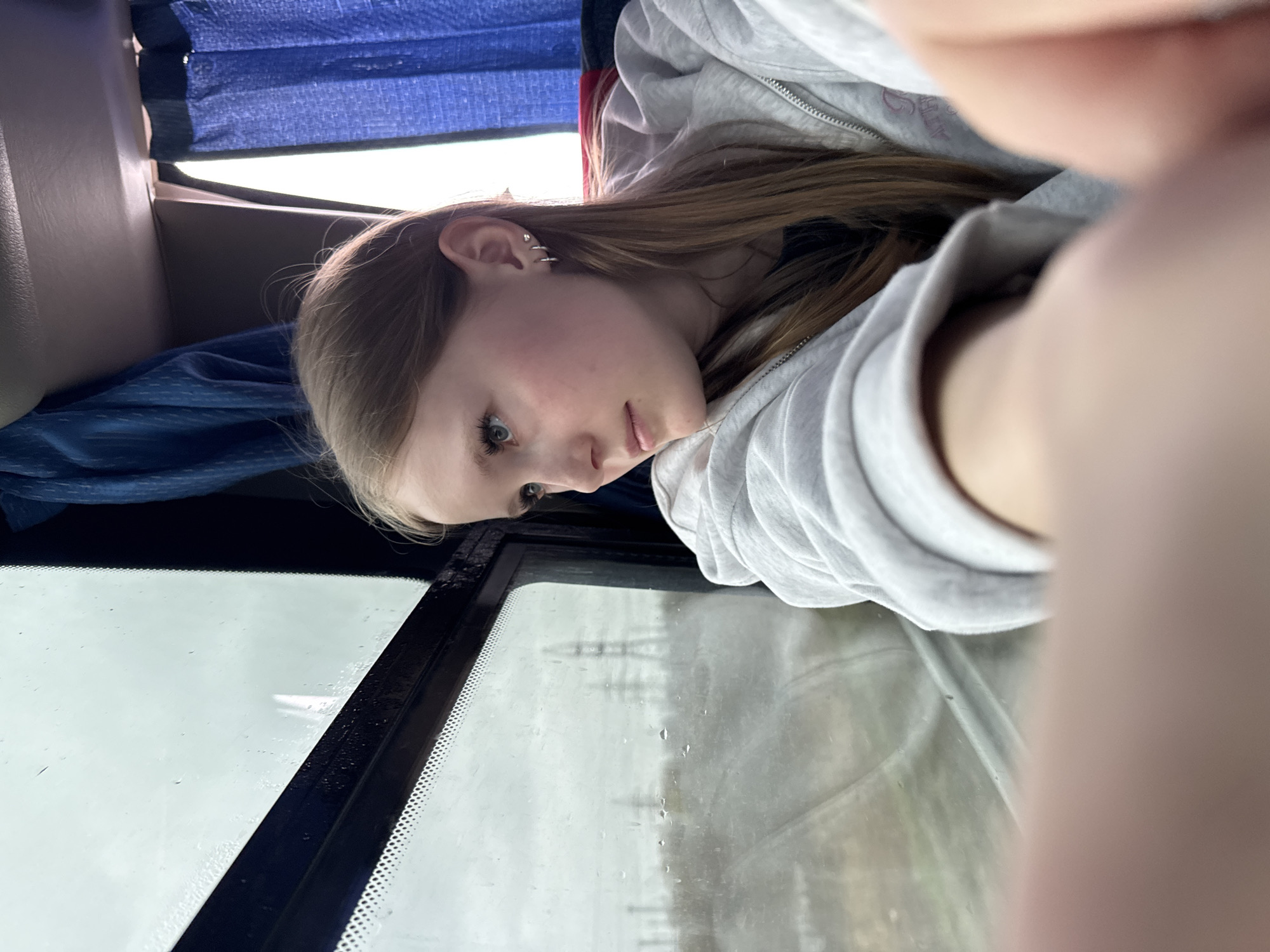 Bus passengers and construction scenes captured in Russian towns