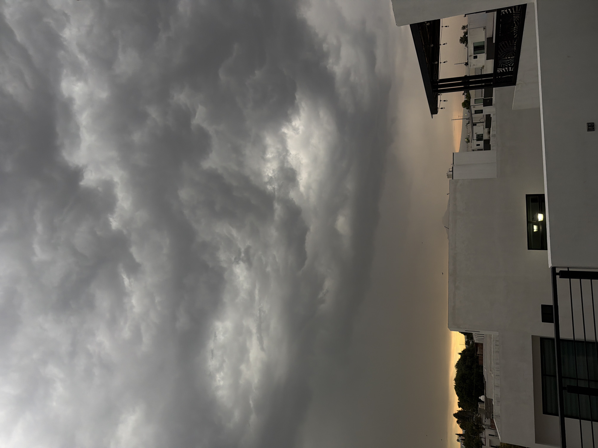Storm clouds create dramatic lighting over Cholula, Mexico