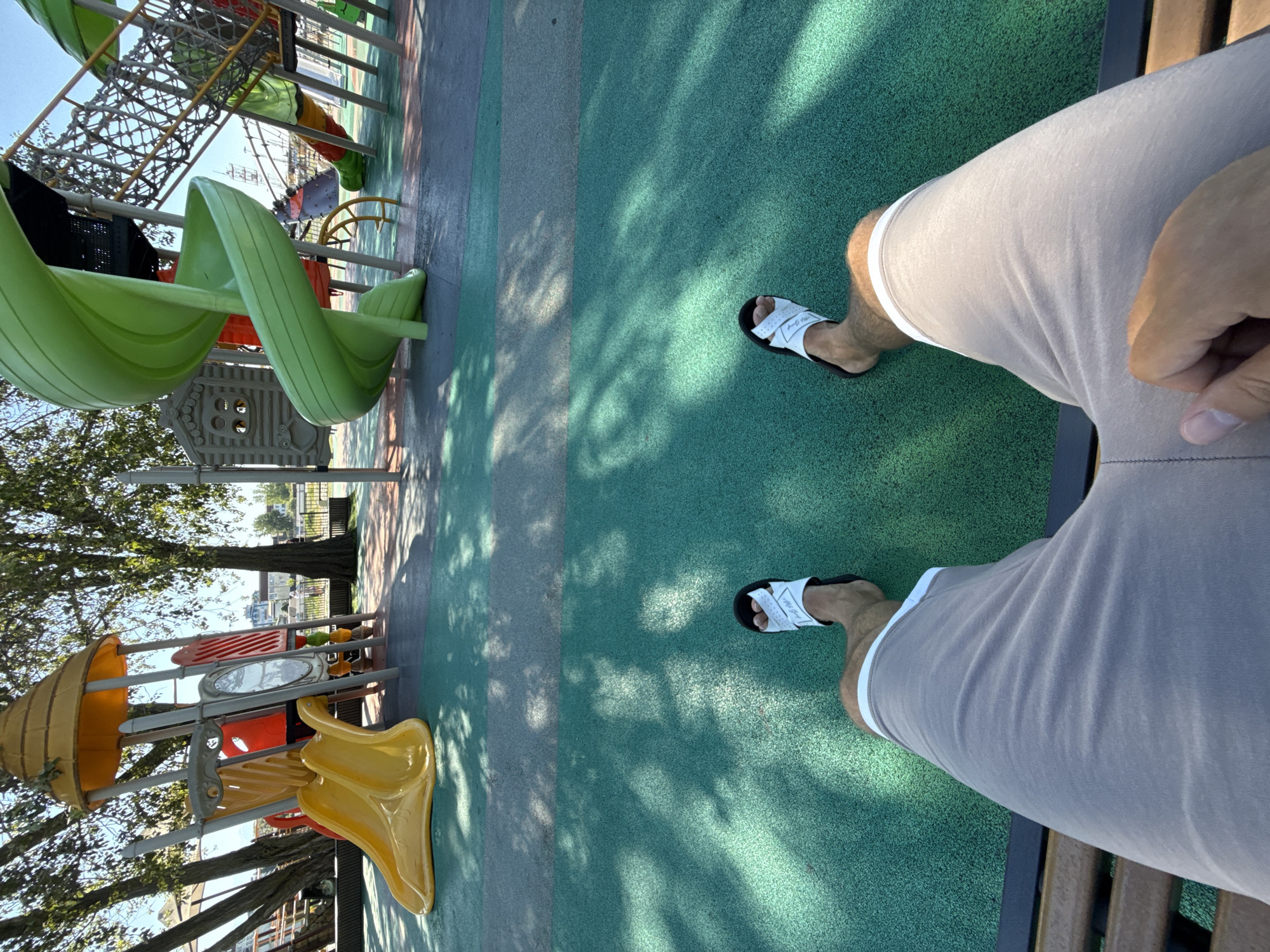 Sunny morning at a Sochi beachside playground with mountain views