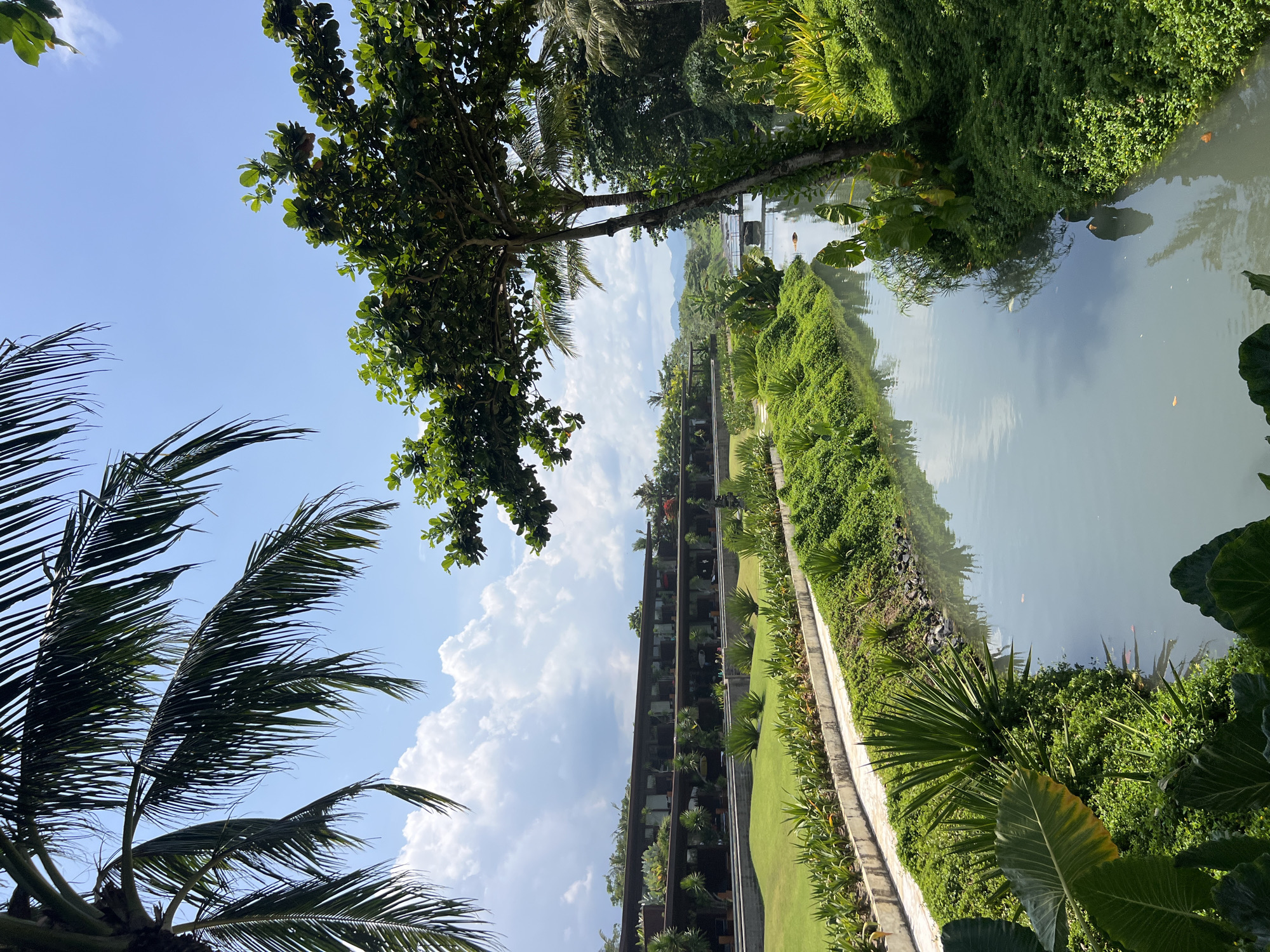 Tourist documents scenic walk through Blahbatuh Indonesia resort areas