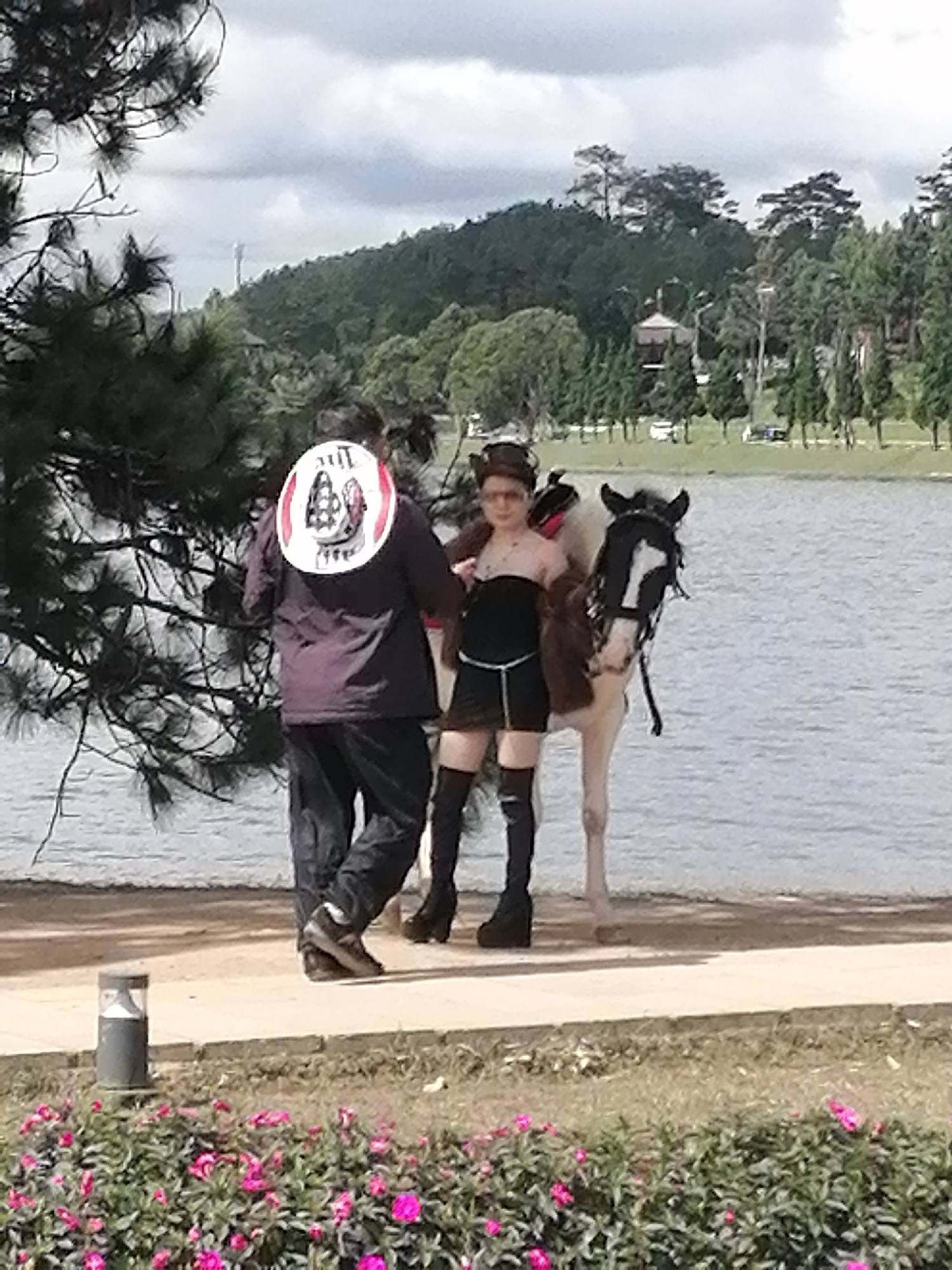 Lakeside horse rides and tourist scenes at Xuan Huong Lake, Da Lat