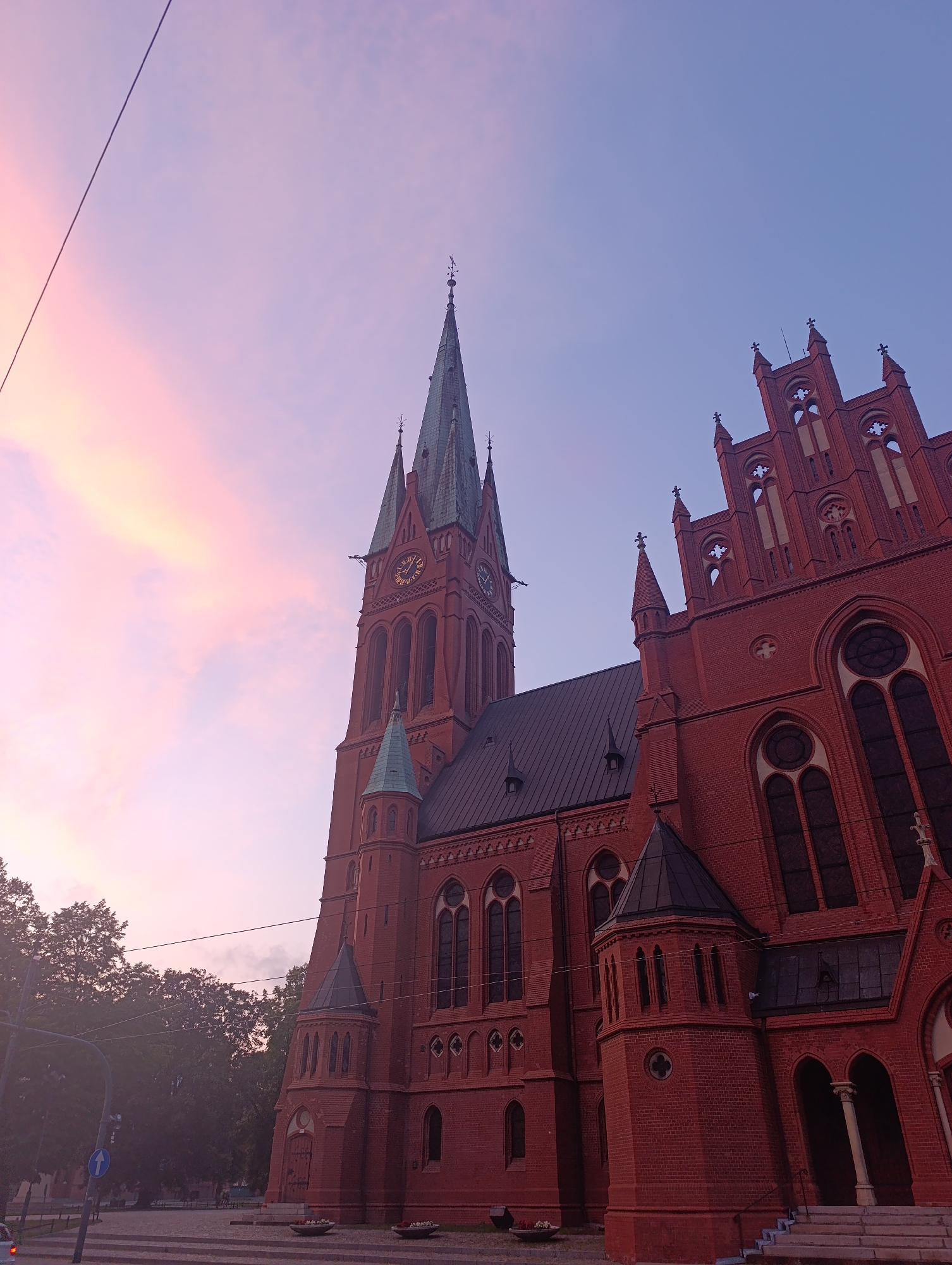 Toruń's Gothic brick churches at dusk, multiple angles