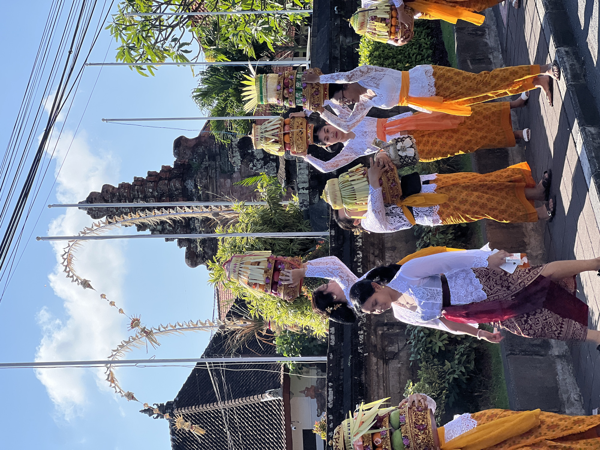 Balinese procession and everyday street life in North Kuta