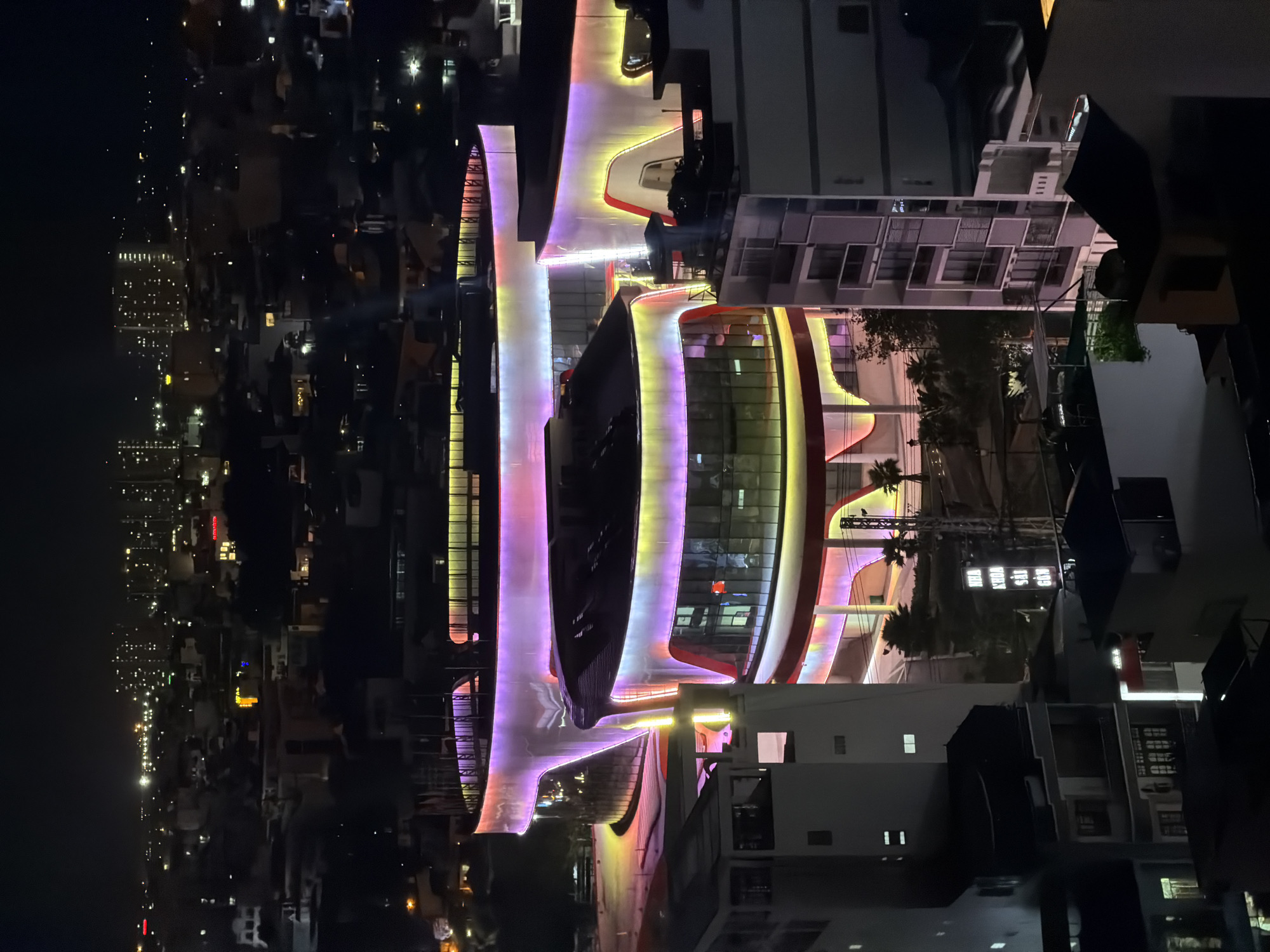 Nighttime aerial documentation of illuminated Nha Trang cityscape captured
