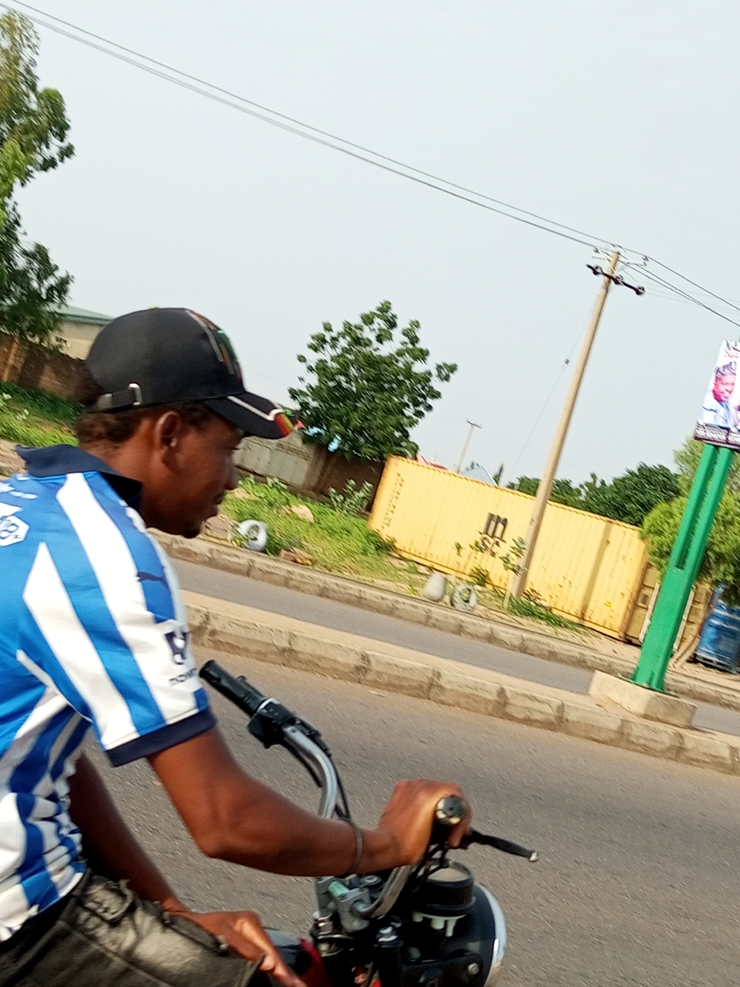 Morning street activity across two neighborhoods in northeast Nigeria