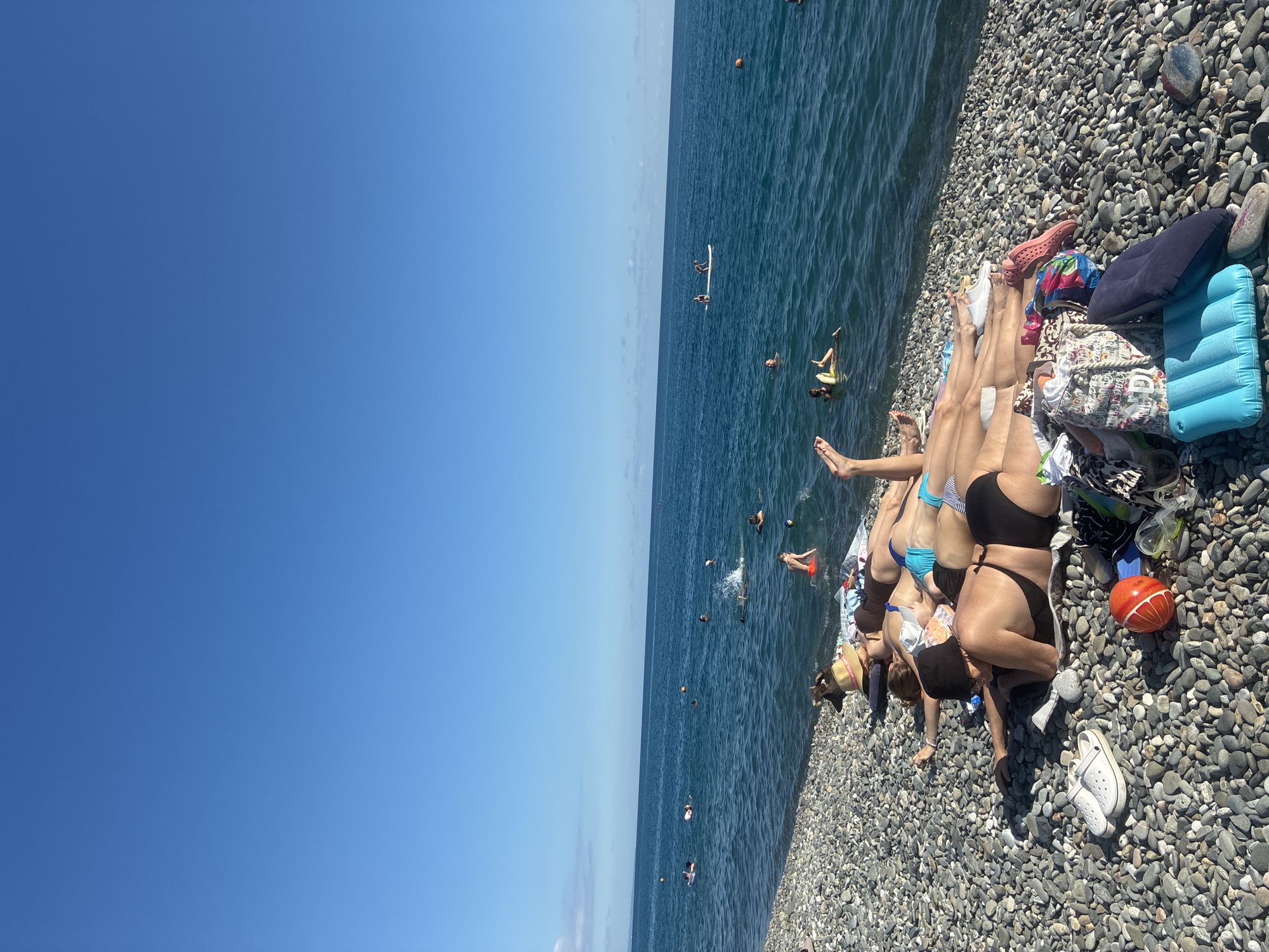 Lazy summer afternoon on the Black Sea pebble beach