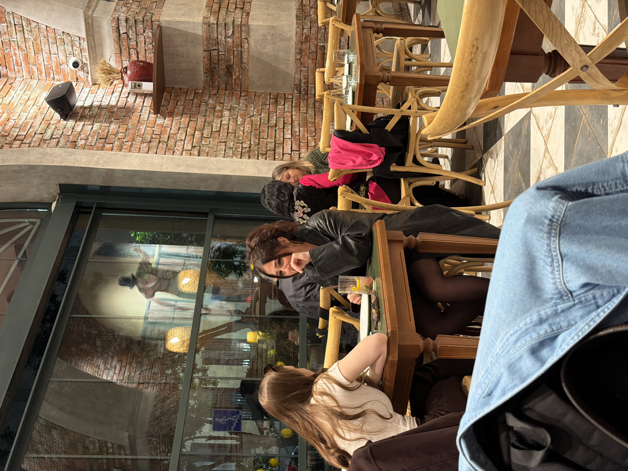 Diners captured at Yerevan restaurant during evening hours