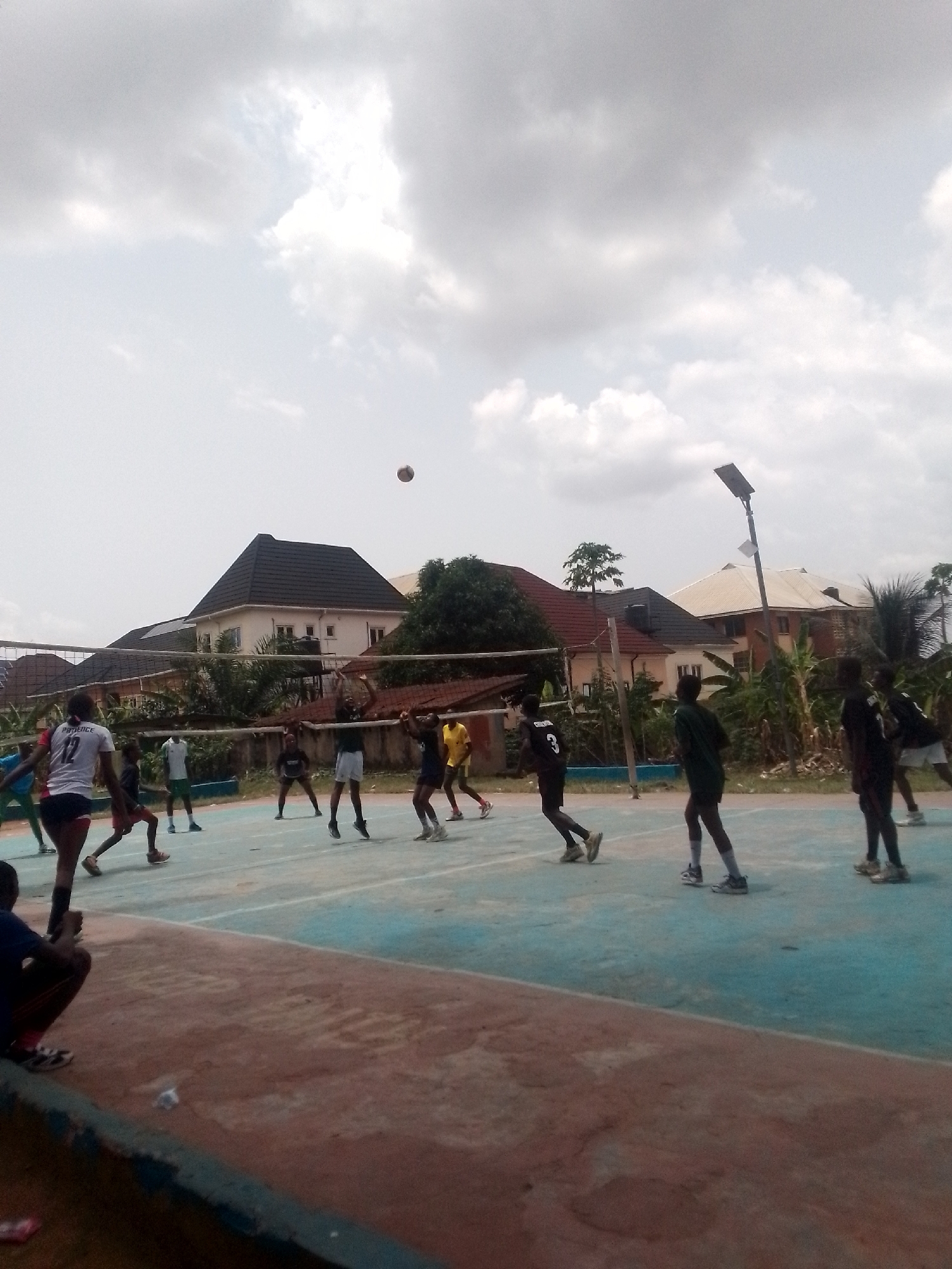 Daily life scenes captured in Onitsha: volleyball game, street view