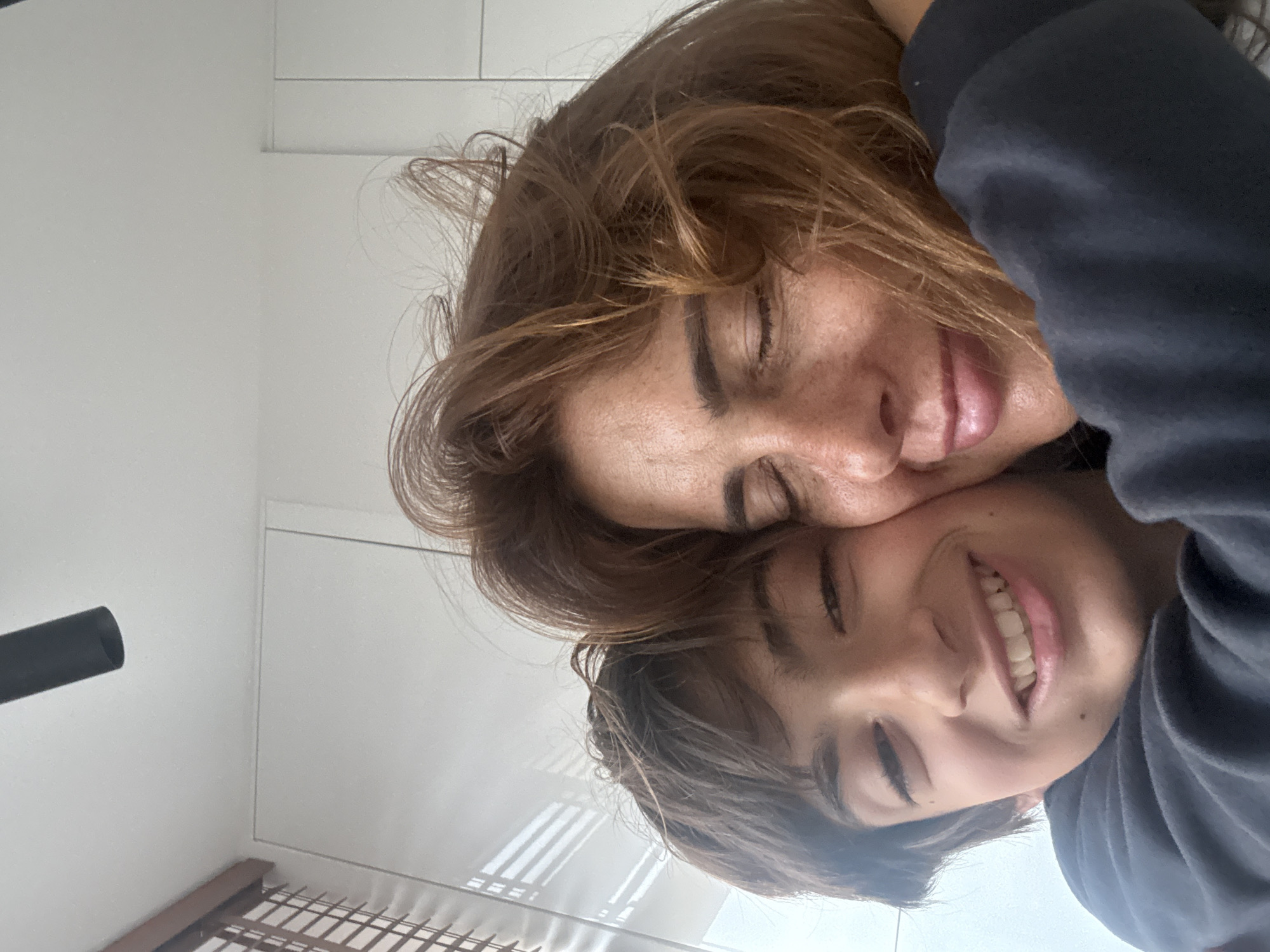 Mother and child share intimate moment in Portugal