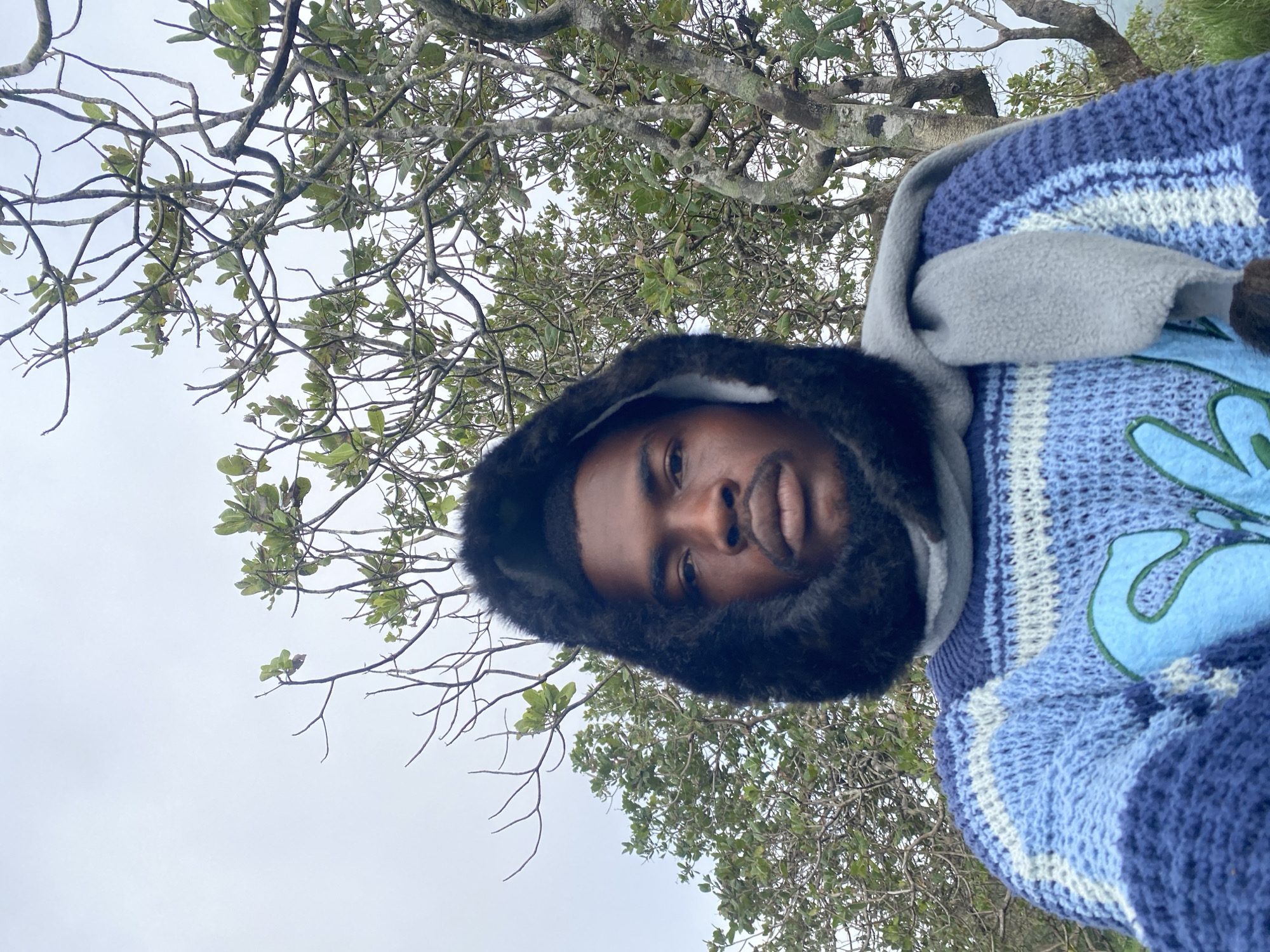 Bundled up outdoors under cloudy skies in Nguzu Edda