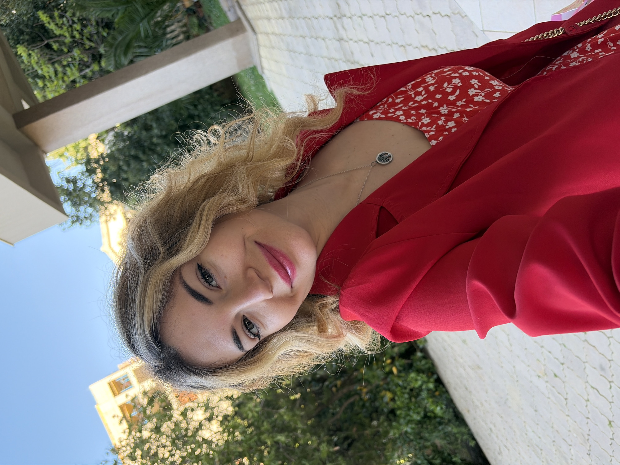 Woman films morning beauty routine in Budva bathroom
