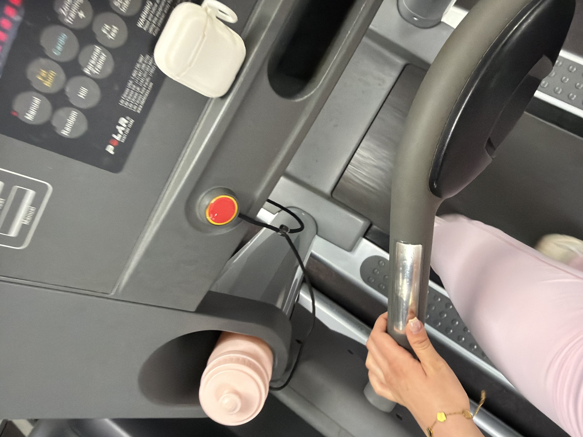 Gym-goer documents treadmill workout with smartphone in Sofia