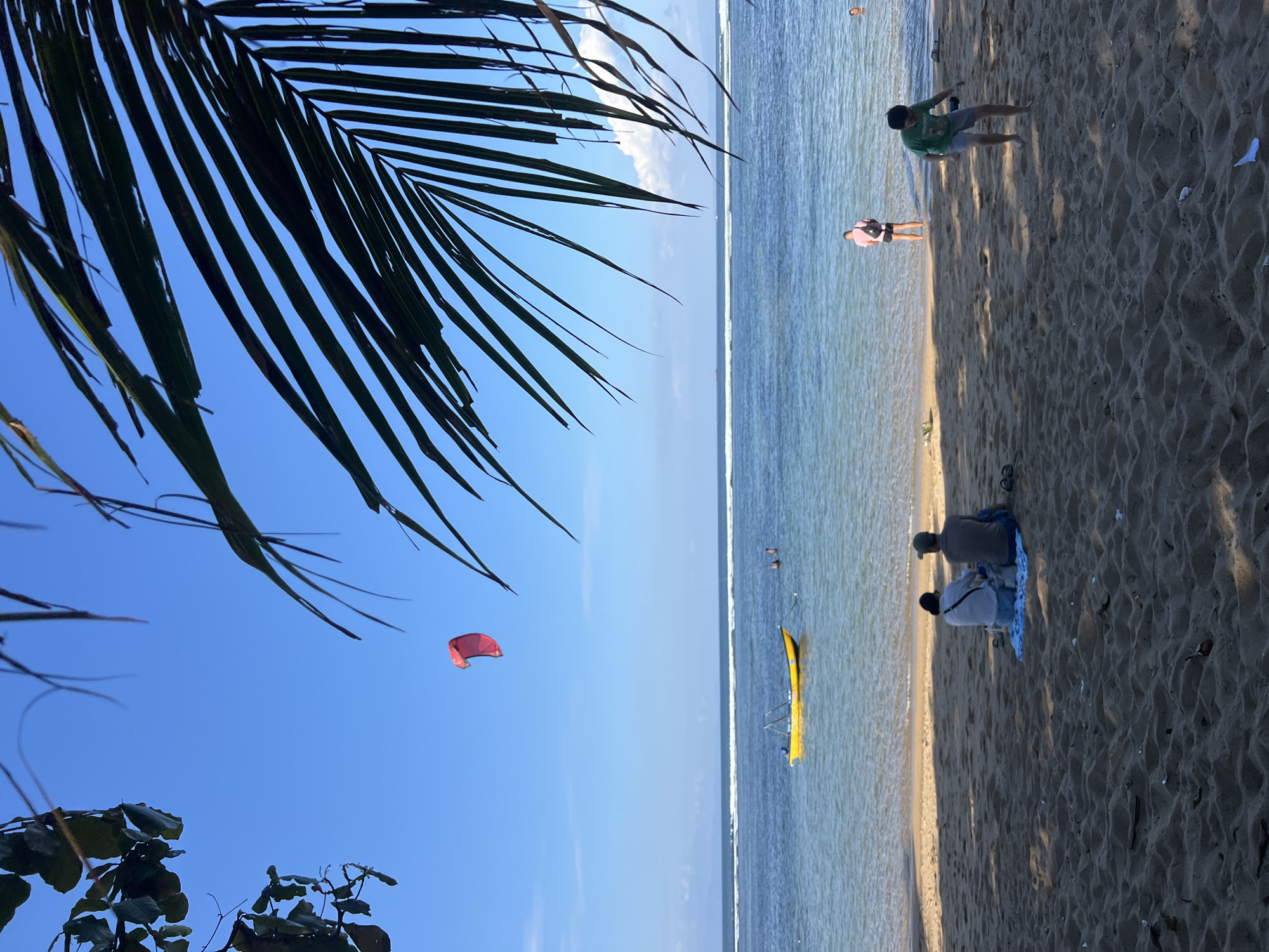 Morning beach activities documented across Denpasar, Indonesia