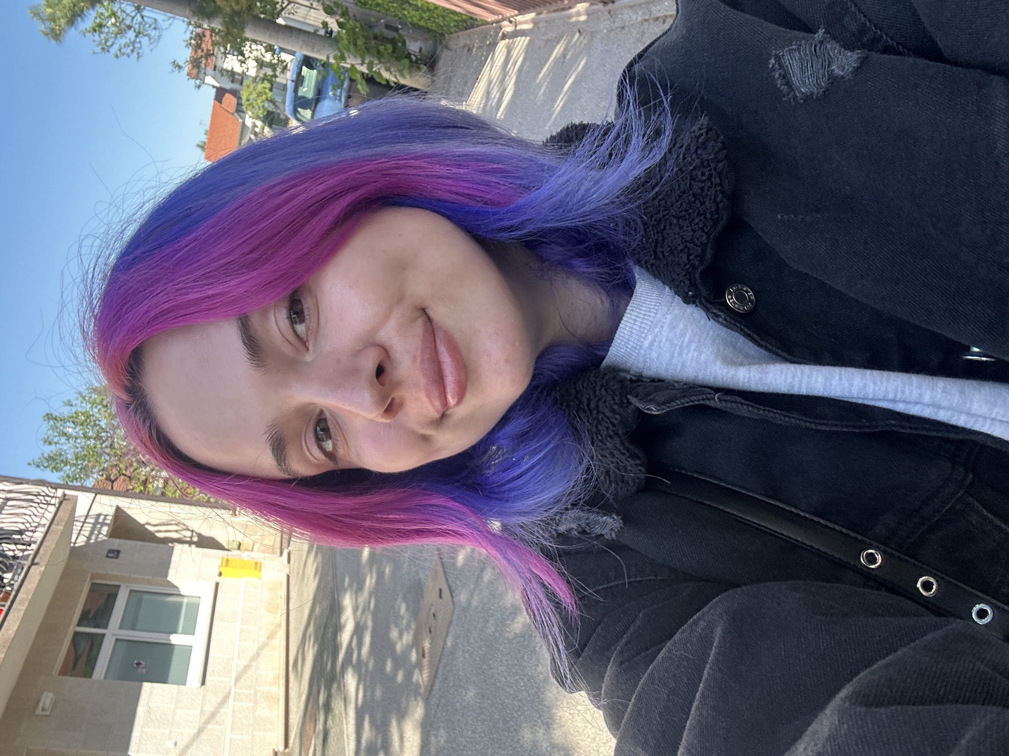 Woman takes colorful hair selfies in Zagreb