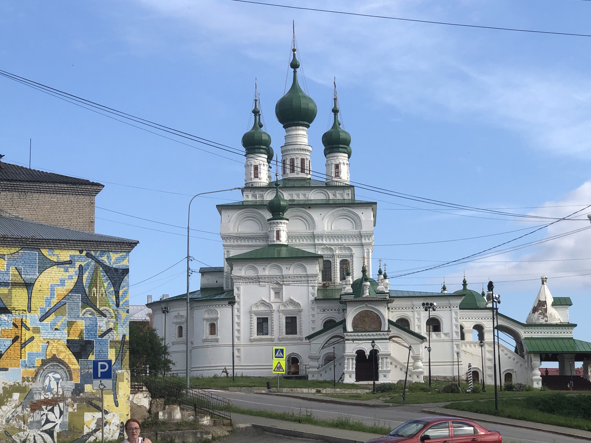 Historic churches and riverside wildlife on a summer afternoon in Solikamsk