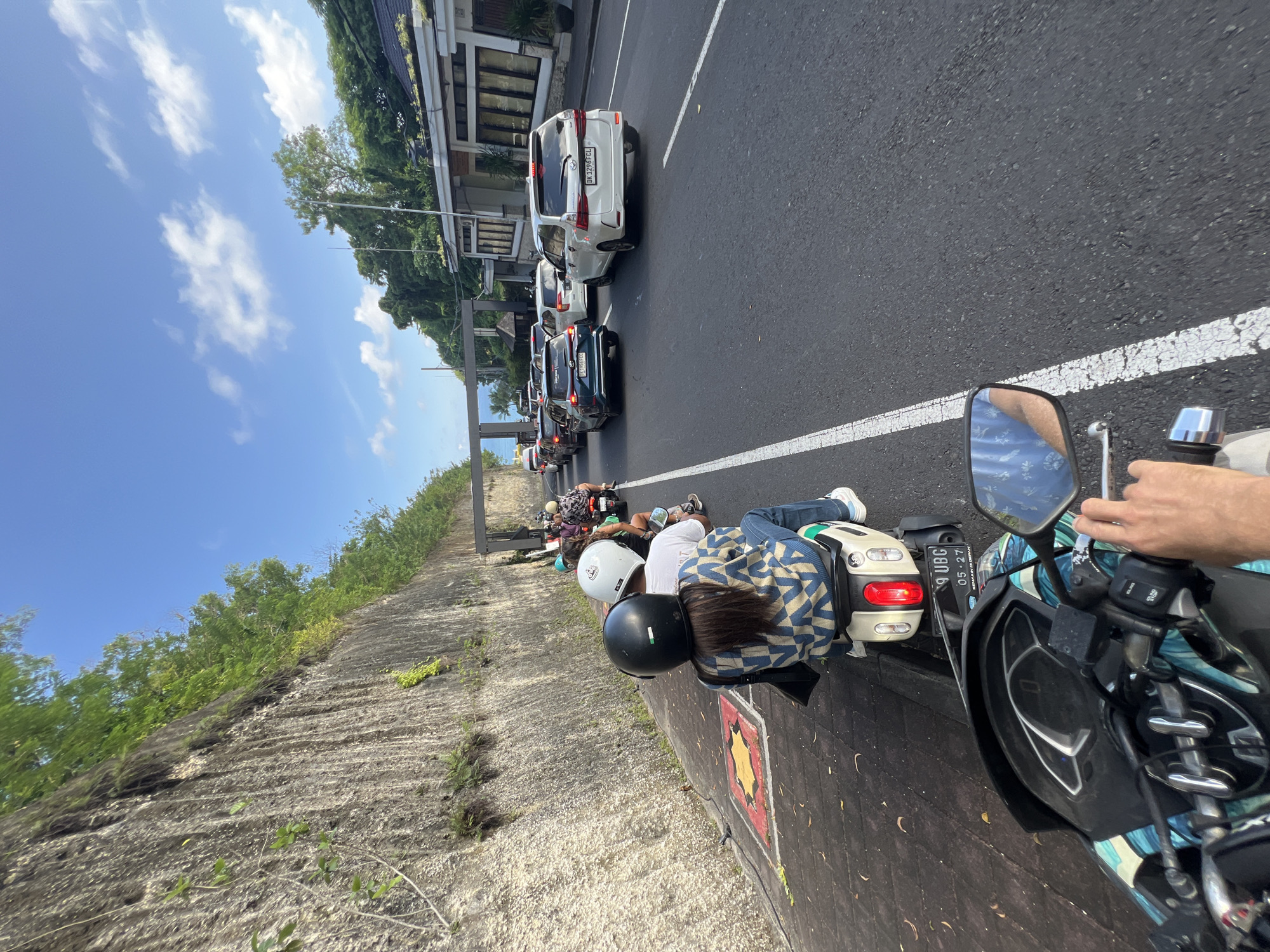 Morning scooter commute and traffic documented in Ungasan, Indonesia