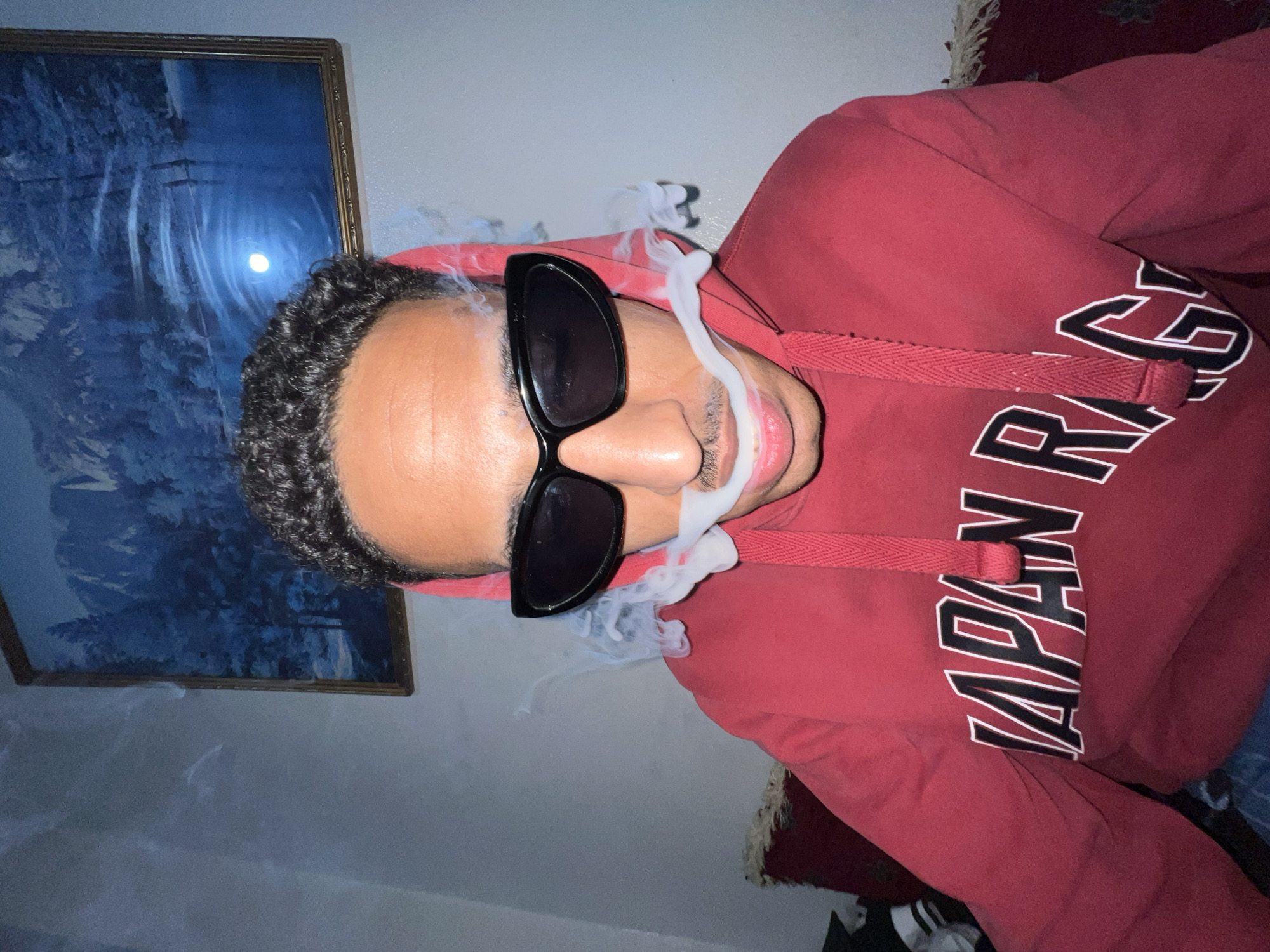 Man smoking indoors in Tangier residence