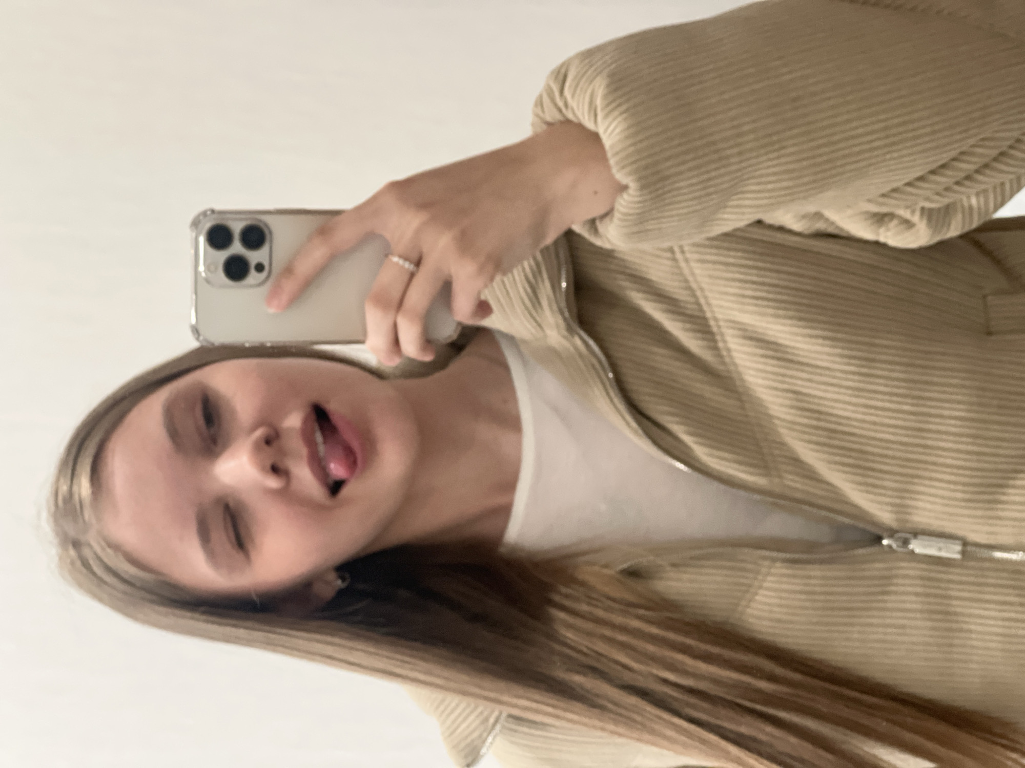 Woman takes selfies with sleeping Scottish Fold cat in Votkinsk