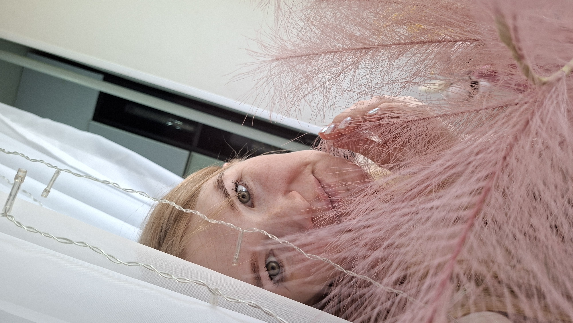 Woman takes early morning selfies with LED lights in Chaikovsky