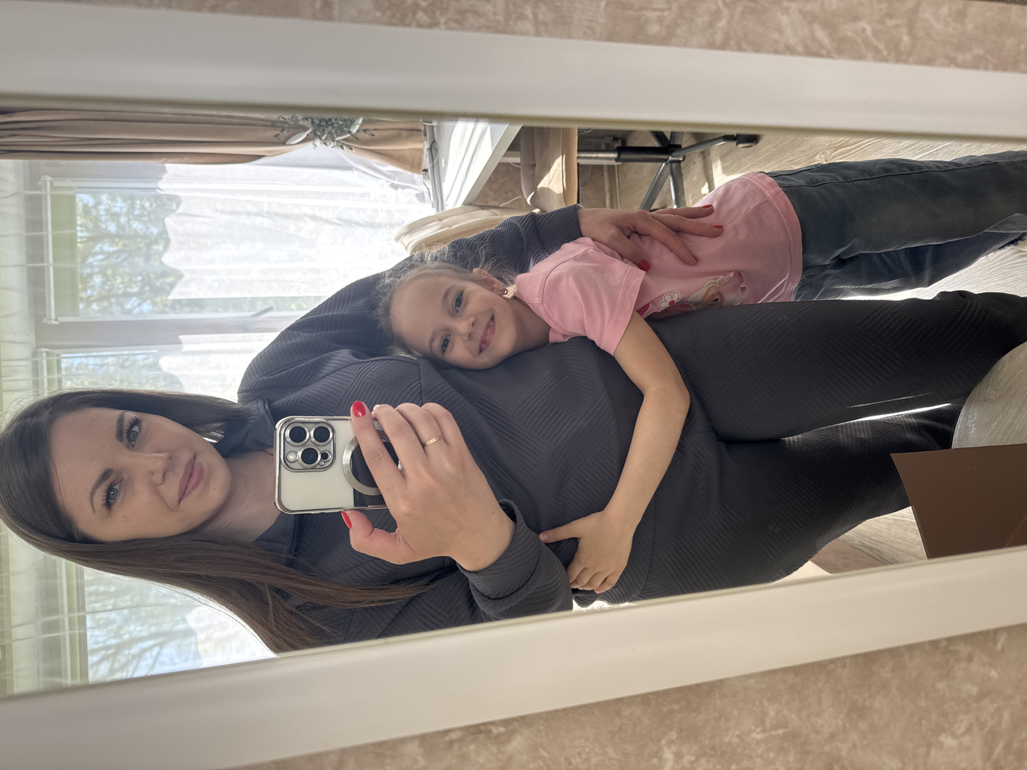 Mother and daughter share morning moments in Russian village