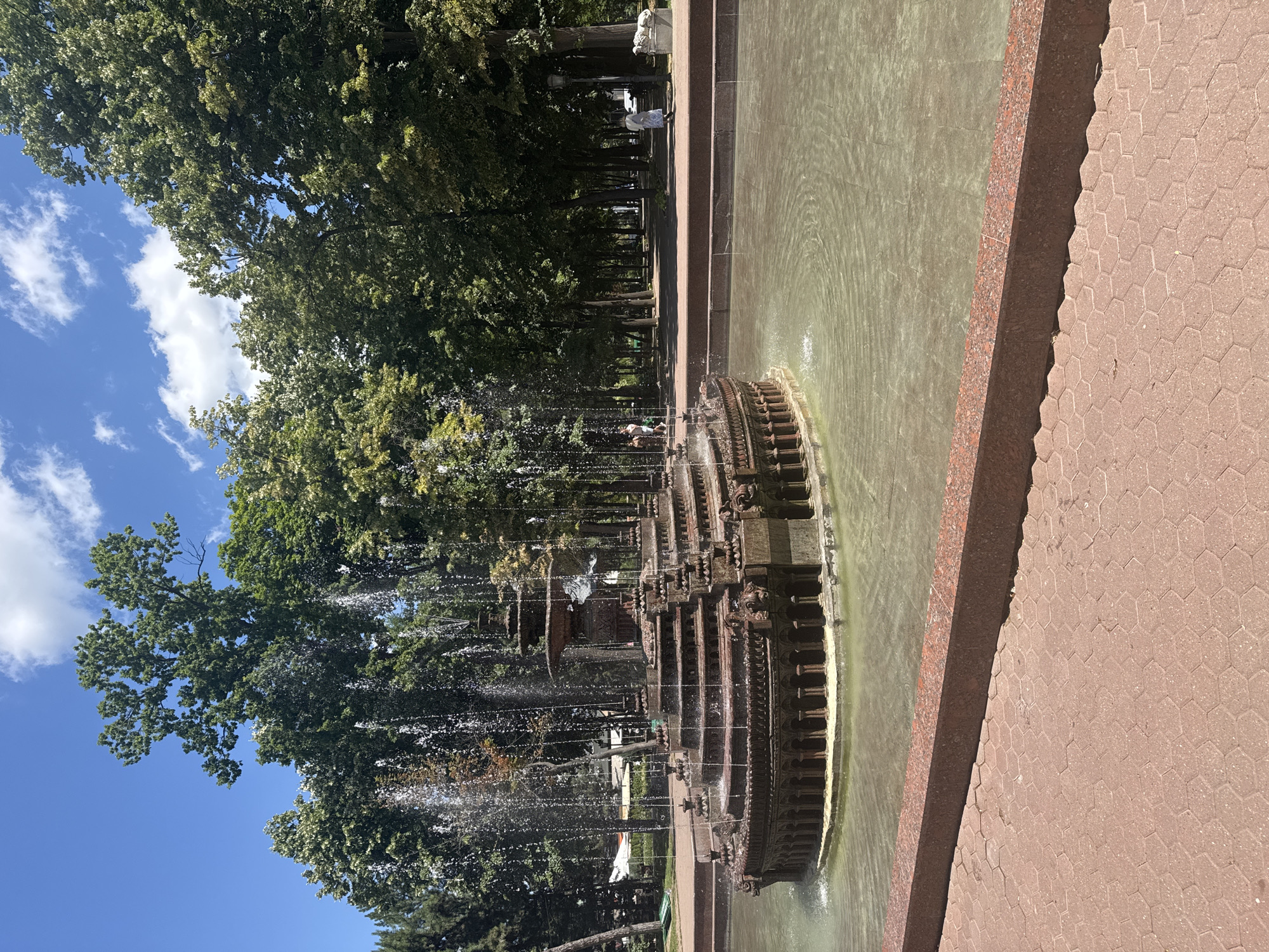 Ornate tiered fountain in a Chișinău park, multiple angles