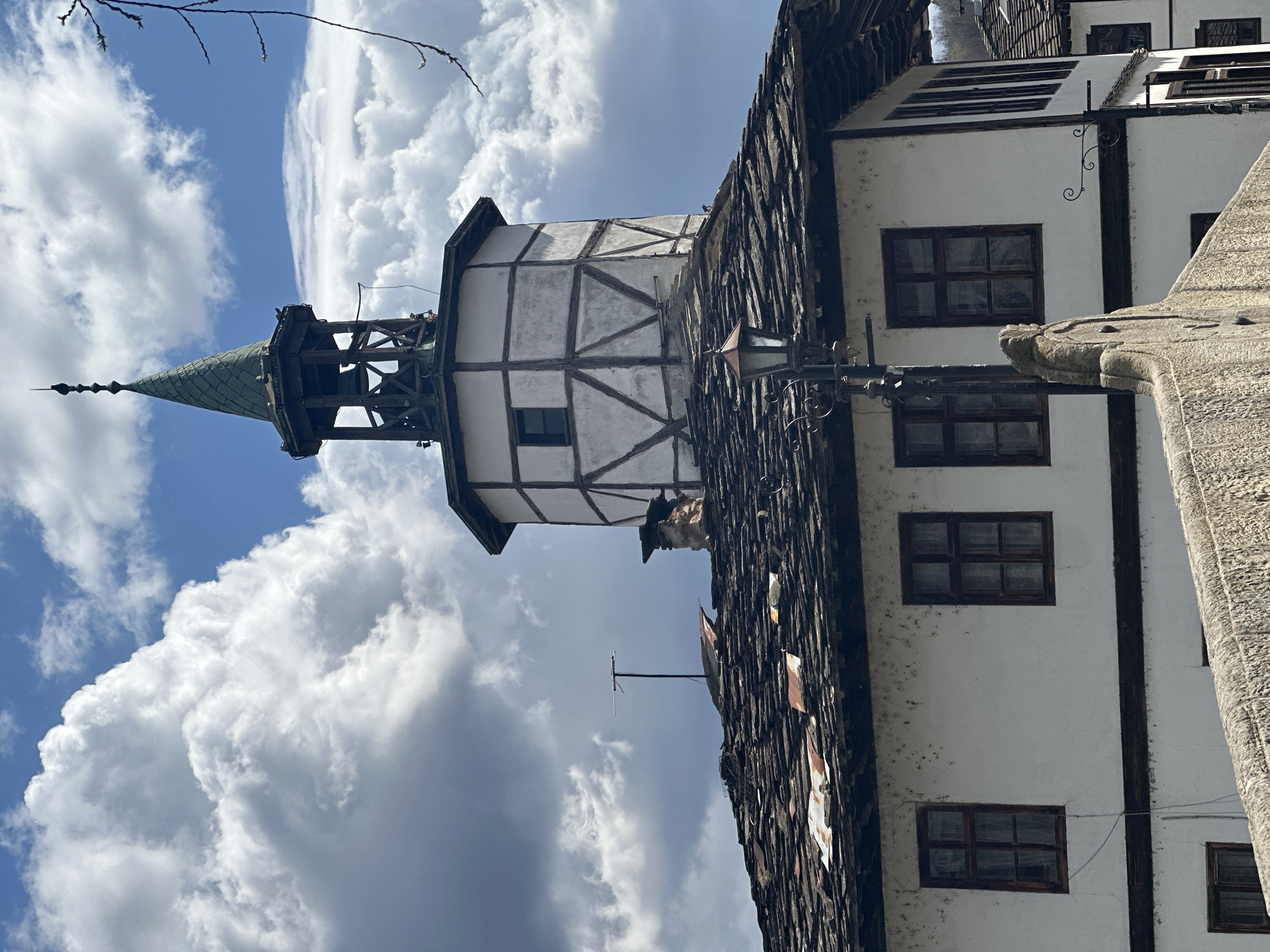 Tourist documents morning walk through historic Tryavna, Bulgaria