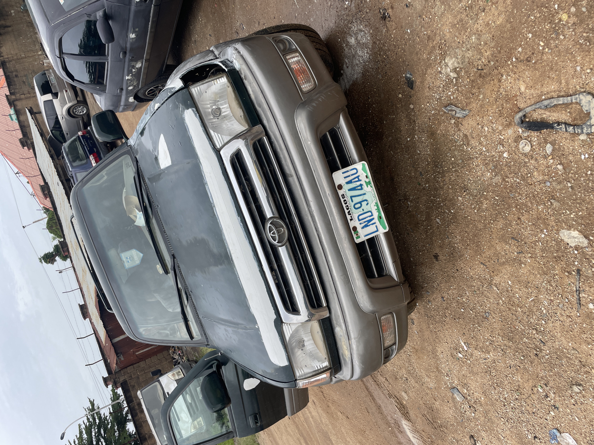 Automotive repair workshop activities documented in New Stadium, Nigeria
