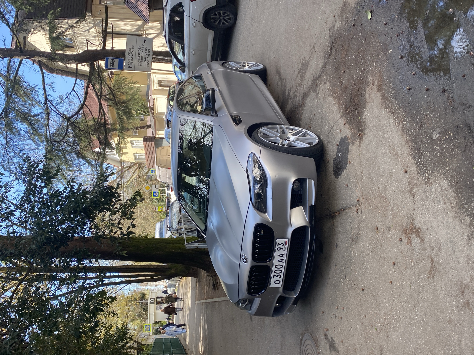 Silver BMW M5 parked on Nevskaya Street in Sochi