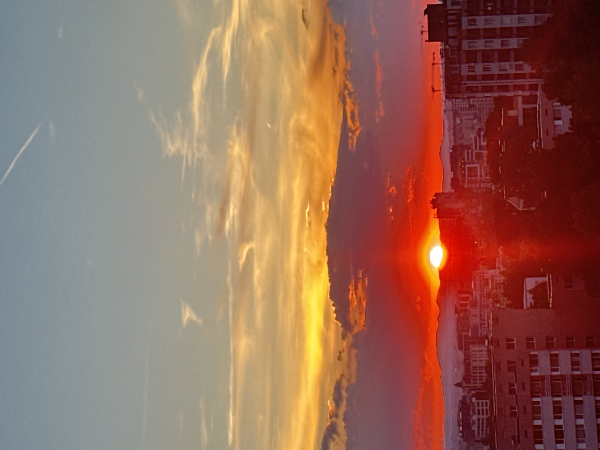 Sofia sunset draws attention from rooftops, windows, and skate parks