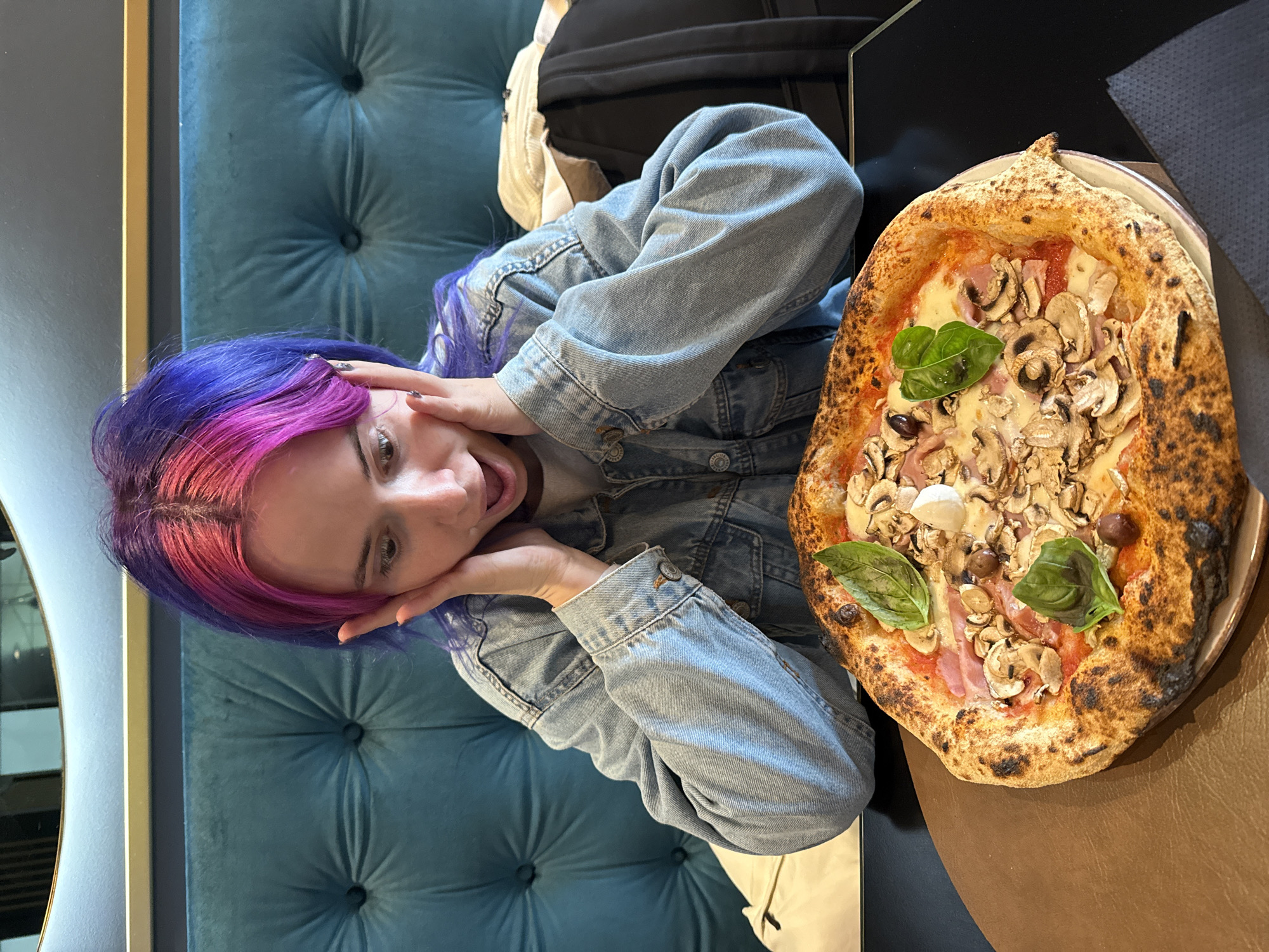 Woman eats pizza with scissors in Zagreb Sunday